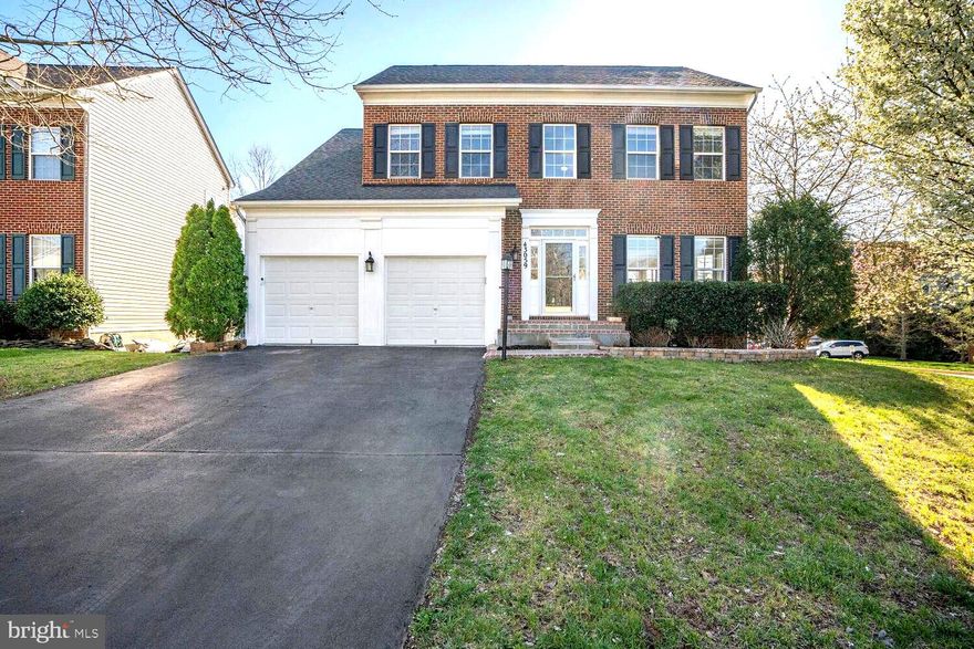 Discover this beautifully maintained and extensively upgraded 5-bedroom, 3.5-bath single-family home in the sought-after The Lakes at Redrock, Northlake Community. Boasting over 4,400 sq ft of living space and a 2-car garage, this exquisite brick-front residence offers an open floor plan with neutral decor and a 2-foot extension on all three levels. The home has been meticulously updated throughout over 200K upgrades, fresh paint applied in 2024 and premium luxury vinyl flooring installed on the main level and second floor.
The gourmet kitchen is a chef's dream, featuring granite countertops, 42" maple wood white cabinets, a center island, walk-in pantry, and high-end stainless-steel appliances including a freestanding range with dual oven, microwave, and a new French door refrigerator with a see-through glass window (2024). The fabulous family room, filled with natural light from numerous windows, with premium windows treatment, showcases a gas fireplace and leads to a huge deck overlooking a fenced backyard with mature trees.

Upstairs, find a luxurious master suite with two large walk-in closets, sitting area and a newly remodeled spa-like bathroom (2023) featuring a free standing bathtub, frameless walk-in shower, new vanities, and lighted anti-fogging mirrors. Three additional bedrooms, an upgraded hall bathroom, and a conveniently located laundry room complete this level.

The fully finished lower level offers a recreation room, additional bedroom or gym, conveys treadmill, a full bath with custom tile work and steam shower, and a kitchenette corner with a refrigerator and all-in-one washer/dryer.

Additional features include Nest thermostats on both levels, WiFi-connected garage door opener, sprinkler system, modern lighting throughout, remote-operated fandeliers in the family room, hallway chandelier, and a 230V electric car charging outlet in the garage. The roof was replaced in 2018, and the wooden deck railings were refreshed in 2023.

Located in the Northlake community, residents enjoy amenities such as a swimming pool, tennis courts, community center, tot lots/playground, and walking trails around lake. This home is situated close to the Leesburg outlets, Dulles Airport, shopping, and restaurants. Don't miss this exceptional property - schedule your viewing today!