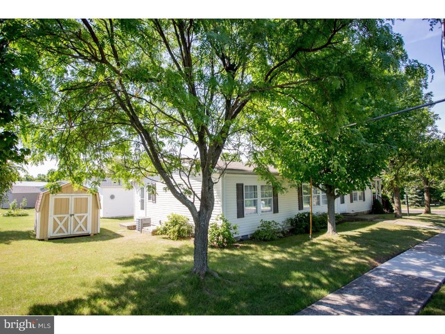 55 and over living at it's best here in Quiet Acres 55 & Over community! Enjoy the spaciousness of an open floor plan or relax sitting on your peaceful front porch which expands across the entire front of this home! Have your morning coffee or an evening refreshment while viewing the large open field with occasional wild turkeys or deer! The wide open Living Room, Formal Dining Room and Kitchen concept is a welcoming invitation! The Dining Room has a brand new sliding door which goes to a convenient side deck. The Kitchen is large with newer appliances, plenty cabinets, lots of counter space and a surround sound built in radio. The large Master Bedroom with walk-in closet has a Full Bath with walk-in shower. The other two Bedrooms have plenty of room and each one also has walk-in closets. Bedroom number three has sliding doors to the front porch. There's a second full family bath with tub and shower. This corner property has great curb appeal. This is retirement living at its best, or if you're thinking of downsizing, this is the way to do it. There is a Clubhouse with frequent activities which helps keep the community engaged. This home is close to routes 309, 113, 152 and 563. Plenty of shopping within 2 miles. (Giant and Home Depot and others) The Sellersville Theater and Washington House are also about one mile away for a Dinner and a Show! If you're looking for affordable, peaceful retirement or downsizing, this is the way to do it! A Must See! Motivated Seller! & Will escrow up to $5,000.00 to replace Heat Pump/AC