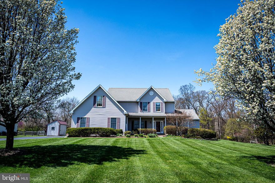 Welcome to 133 Greenwood Ave, located on a gorgeous 1.3 acre lot backing to woods.  This well-maintained home boasts approx. 2,500sf of living space, a dramatic  great room with a gas fireplace, vaulted ceiling and a 1st floor main bedroom w/ensuite.  The sunlight filled kitchen and dinning area opens into the great room.  A living room and half bath complete the 1st floor.  The 2nd floor features an over look of the great room along with 3 bedrooms, a full bathroom and a large storage room that can be converted into an office, play room, etc…  The dry unfinished basement is a blank canvas for your creativity, ready to be finished.  The very spacious 3 car garage provides additional storage space.  Outdoor living space includes a wrap-around front porch and a paver patio.   Springford schools and close to downtown Collegeville.  Book your showing today!!