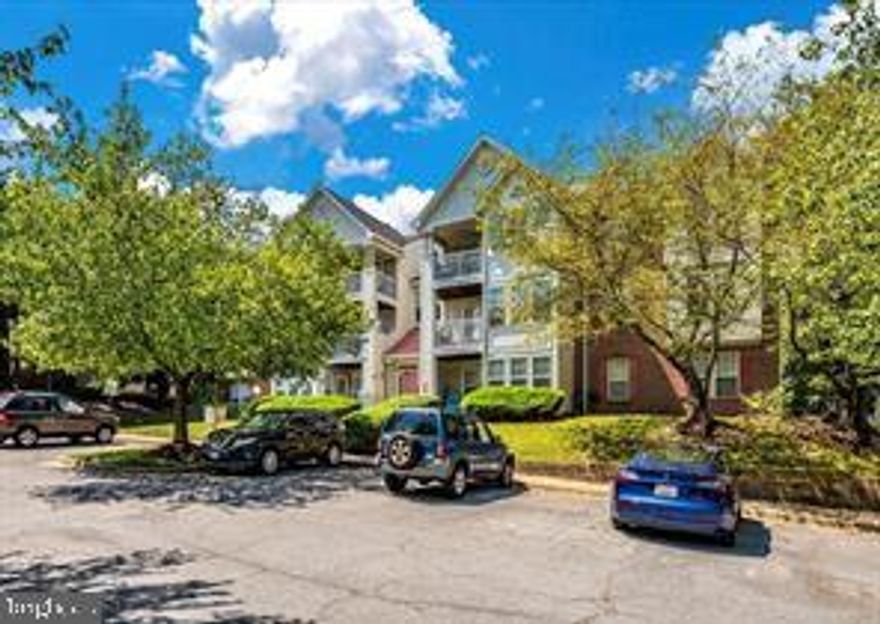 This is a 1198 square foot condo, located in a highly desirable neighborhood and community.  It features two bedrooms and two full bathrooms, along with a morning room off the kitchen.  The primary bedroom features an ample walk-in closet.  The balcony at the rear of the unit provides a view of the surrounding trees, adding a touch of privacy.  The unit has a washer and dryer included and the condo fee covers water and sewer.  The lobby of the building was renovated in 2025.