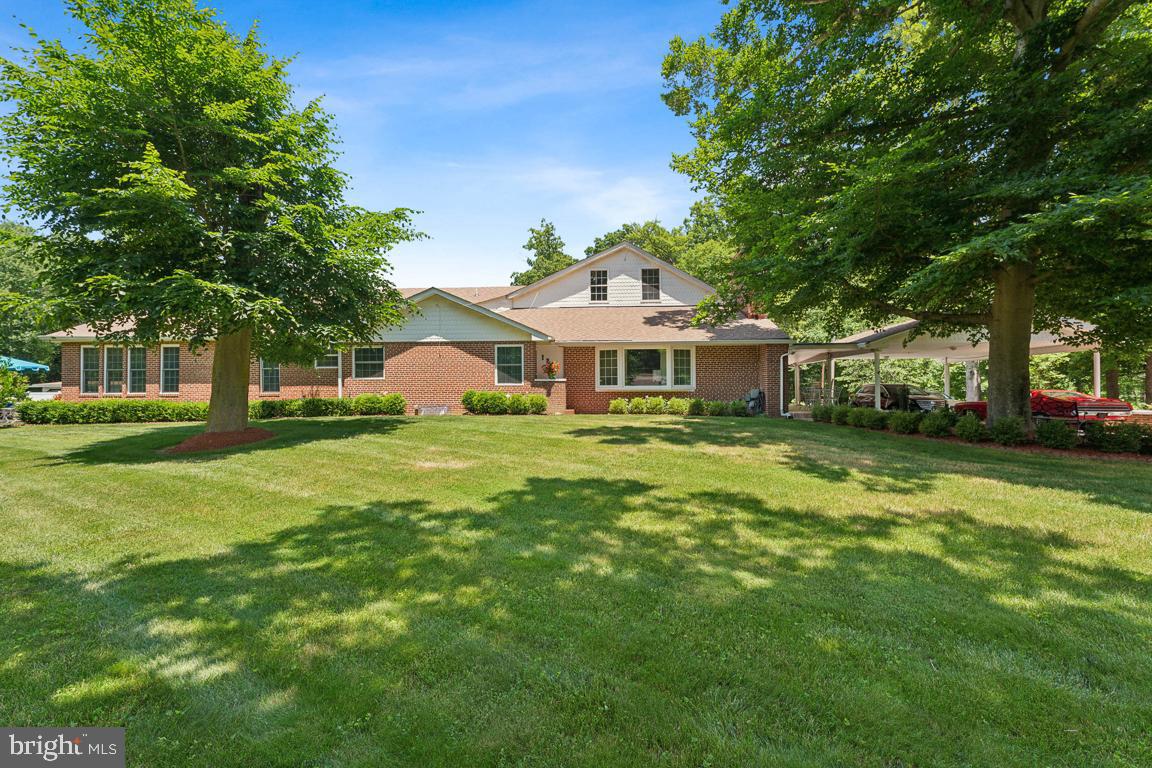 Discover refined living at 1211 Pine Lane, a distinguished 4-bedroom, 4.5-bath raised rambler thoughtfully designed for comfort and style. This beautifully maintained residence features gleaming hardwood floors on the main level and a spacious primary suite with a private sitting area. Each bedroom is complete with its own en-suite bath, creating the ultimate retreat for family and guests.
The lower level offers an entertaining space with a wet bar, home gym, and versatile lounge areas. Step outside to one of multiple inviting patios or relax in the screened gazebo, perfect for elegant outdoor gatherings.
Ideally located in Accokeek, this estate blends privacy with accessibility to commuter routes, shopping, and dining. A unique opportunity to own a home that balances timeless elegance with modern convenience.