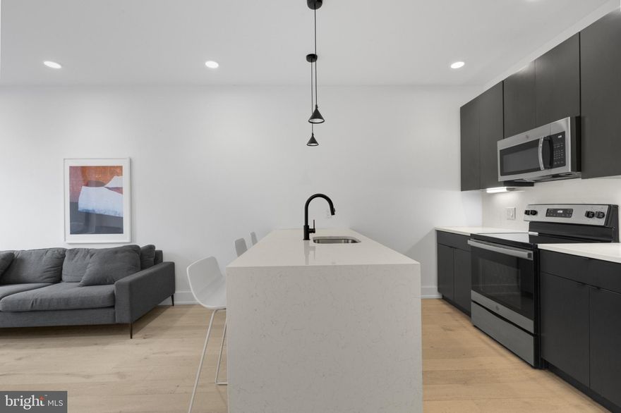 Available Now | Leasing Special: 1 month FREE on a 13-month lease! Advertised price reflects the leasing special, tenant to pay the advertised rent monthly. Gross rent is $1,825/month, net effective rent is $1,685/month. 

Welcome to 965 Frankford Ave! This chic building features an elevator for easy access and offers a comfortable living experience. Unit #504 is a stunning 2 bedroom, 2 bathroom + Den apartment on the fifth floor.  Inside, you'll enjoy the convenience of central air, elegant wood floors, and stylish recessed lighting throughout. Experience open floor plans that maximize space and natural light, seamlessly connecting the living and dining areas. The kitchens combine style and functionality with modern fixtures and stainless steel appliances. Bathrooms are thoughtfully designed with sleek vanities, medicine cabinets, and contemporary finishes. The sizable bedroom offers plenty of space and abundant natural light, offering a bright and comfortable retreat. Enjoy the building's inviting common areas, including a rooftop deck and a versatile flex space with comfortable couches, tables, and a kitchen. Additional amenities include basement storage and a welcoming entry lounge area. Please note: photos are from a similar unit within the building; exact layouts & finishes may vary.

Lease Terms:

Generally, 1st month, 12th month, and 1 month security deposit due at, or prior to, lease signing. Other terms may be required by Landlord. $55 application fee per applicant. Pets 80lbs and under are conditional on owner's approval and may require an additional fee and/or monthly pet rent, if accepted. (Generally, $250/pet one time fee plus $25 per month pet rent). Tenants responsible for: electricity, cable, water, and a $50/month amenity fee (includes amenity spaces, 1 storage locker, and building-wide wifi access). Landlord Requirements: Applicants to make 3x the monthly rent in verifiable net income, credit history to be considered (i.e. no active collections), no evictions within the past 4 years, and must have a verifiable rental history with on-time rental payments. Exceptions to this criteria may exist under the law and will be considered.