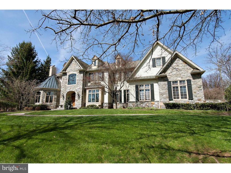 Timeless, Tasteful, and Elegant! Located in Lower Gwynedd Valley in "The Woods at Gwynedd". The original custom sample home built by the builder Philameno and Salamone, is now awaiting its next proud owners. Grace and elegance are the hallmarks of this luxurious home! The Striking two-story foyer with a grand turned staircase and Juliette balcony overlooking both the foyer and gathering room. The impeccably appointed gourmet kitchen sets the tone for this impressive home. With a gourmet kitchen and butler pantry and back staircase, no host could ask for more. Boasting an abundance of counter space with a center island and a second prepping sink, in addition to the island seating, the custom cabinetry includes a built-in desk workstation. There is an eating area with a panoramic view of the in-ground pool, Koi pond, and outstanding hardscaping within its own intimate setting. The adjacent family room with cathedral ceilings has an array of windows from nearly floor to ceiling, allowing the natural light to fill the home and enhance all the stunning wooden architecture. The custom architectural features included are a bookshelf wall, wet bar and gas fireplace. When entertaining a large gathering, it can easily spill over into the spacious formal living room with fireplace as well as the gorgeous library embellished with walls of wood coffered, wooden bookshelves and breathtaking coffered wood ceiling, as well as a full private bathroom. After completing the main level, we travel to the master suite which is a sanctuary by itself. Double doors open to a spacious suite with a tray ceiling, and double columned entry into the sitting area with a gas fireplace. Additionally, you will enjoy your sliding doors that open onto a private covered deck overlooking the professionally landscaped and private backyard vacation spot. The master bath offers a dressing area, 3 walk-in closets, 3 linen closets, 2 vanities, a whirlpool tub, a water closet, and large tiled shower. The additional 3 bedrooms consist of one princess suite that could serve as an optional master bedroom and two other bedrooms that share a jack/jill bathroom completing the upper floor. The finished lower level has details that will impress all. A built- in wet bar, gas fireplace, media room, work-out room with its own full bathroom and plenty of storage complete this floor. Quality features throughout; HVAC in garage, built in sound system, 4 zone HVAC, ***Newly finished hardwood floors throughout!