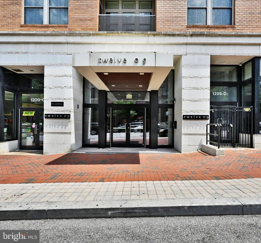 Introducing 1209 N Charles St, #110, a delightful residence with 1 bedroom, 1 bathroom, and approximately 1,179 SQ FT of living space. This unit exudes a sense of openness, featuring tall ceilings, abundant light pouring in through oversized windows, and a serene private courtyard patio. The Gourmet Kitchen boasts elegant stainless-steel appliances, perfect for culinary enthusiasts. Step into the bedroom, where a large walk-in closet and luxurious carpeting await, offering comfort and convenience. Moreover, this secure building offers a host of amenities, including a gym in close proximity to the unit, an assigned parking space and storage unit. Located near Penn station, this location offers effortless access to various highways, restaurants, universities, and more! Don't miss out on this wonderful opportunity - schedule your showing today!