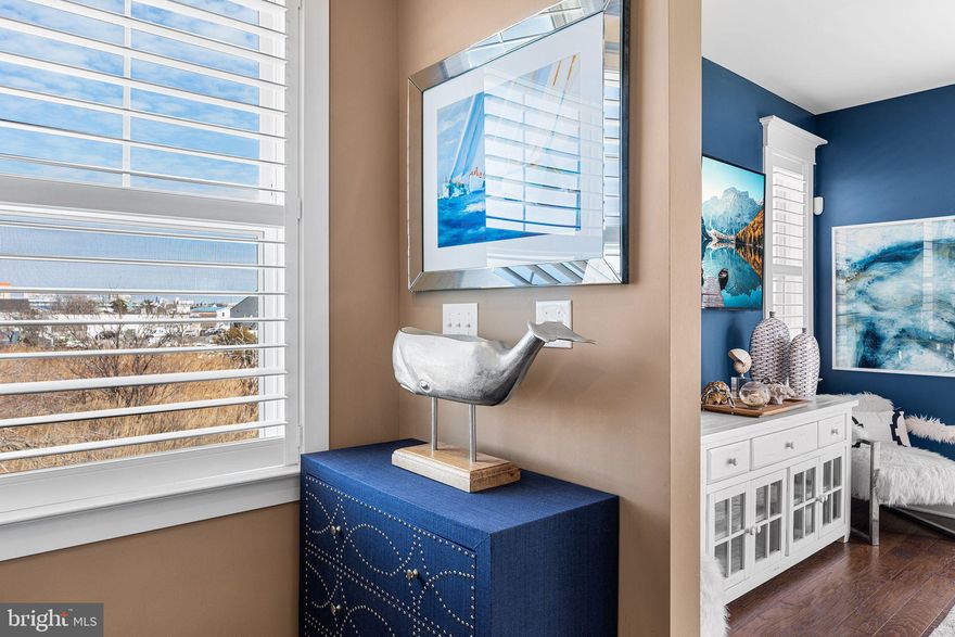 Rare Waterview End-Unit Townhome in Broad Marsh – Prime Midtown Location!

Welcome to your dream 4-bedroom, 3.5-bathroom beach retreat—where luxury meets laid-back coastal charm.  Low HOA Fees – High Value! Unlike many other communities, Broad Marsh offers incredible amenities with HOA dues of just $170 per month—significantly lower than comparable neighborhoods. Enjoy affordable coastal living without sacrificing convenience or luxury! Nestled bayside in the highly sought-after Broad Marsh neighborhood, this meticulously maintained, professionally decorated home offers an unparalleled blend of comfort, style, and high-end upgrades—all without the high costs!

From the moment you step inside, you’ll be captivated by the thoughtful upgrades and coastal-inspired details that set this home apart. The modern chef’s kitchen boasts upgraded granite countertops, an upgraded cabinet package, stainless-steel appliances, and a spacious breakfast bar—perfect for hosting family and friends. Custom window treatments, plantation shutters, upgraded lighting, crown molding, and an upgraded trim package throughout enhance the elegant yet relaxed coastal vibe.

Unmatched Luxury & High-End Upgrades. Hardwood floors throughout. Juliette balcony off the primary bedroom. Bose surround sound system. Upgraded tile bath/shower package throughout. Central vacuum system. Security system with camera.

Unbeatable Location & Outdoor Living, rare ocean and bay views! Enjoy breathtaking sunrises from one of two east-facing balconies and unwind with stunning sunsets from any of the three west-facing balconies. Oversized garage with ample parking for family and friends. With a traffic light at 70th Street, you can walk to the beach in just 3-4 minutes! Community pool & boat ramp just steps away. Possible boat slip rentals available from other owners. Protected marshland behind the home that can’t be built on, ensuring privacy and breathtaking natural views.

Prime Midtown Location Situated in the heart of mid-town Ocean City, this home offers the best of both worlds—a peaceful, upscale setting just moments from the beach, top restaurants, entertainment, and shopping. Walk to Longboard Café, local shopping centers, and the beach with ease!

This is a rare opportunity to own one of Broad Marsh’s best end-unit water view townhomes. With stunning views, luxury upgrades, and an unbeatable location, this home won’t last long. Schedule your private showing today!