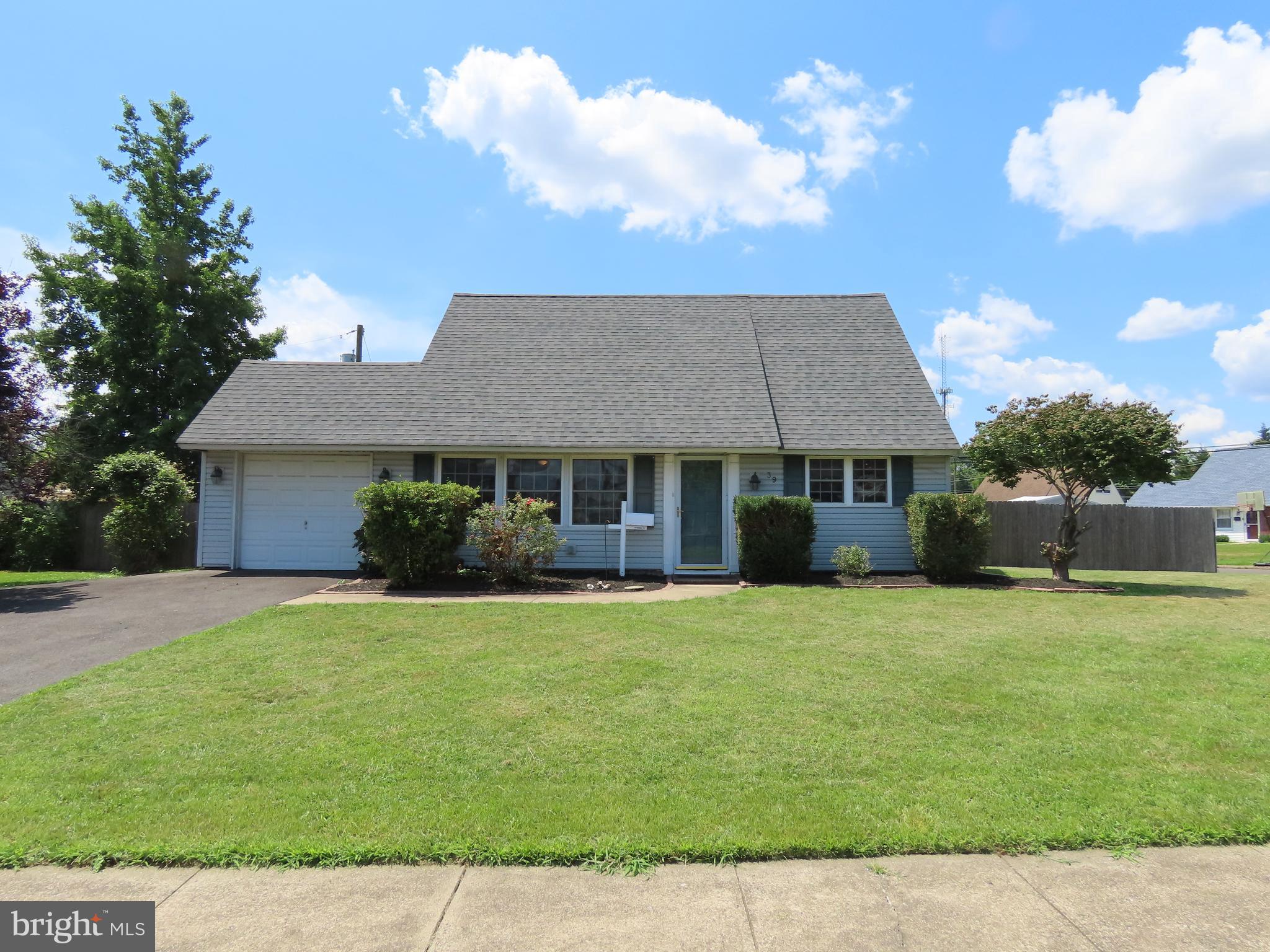 Not your ordinary Levittown house, this is a Unique home with great features including Natural Gas and a huge addition that added a 5th bedroom and large 29 x 16 ft family room with a fireplace. Freshly Painted and New Carpet with Central Air an Extra Large fenced in yard are just a few of the nice features of this home offers. The Roof, Heater and A/C have been replaced approximately 5 years ago. The first floor features 3 bedrooms with a large primary bedroom, a Jack and Jill bathroom and the second floor has 2 additional bedrooms. There is access to the home from the garage into the mud/ laundry room and the driveway has been expanded to accommodate 3 or more cars. This is a very rare gem that needs a little polishing but worth it!