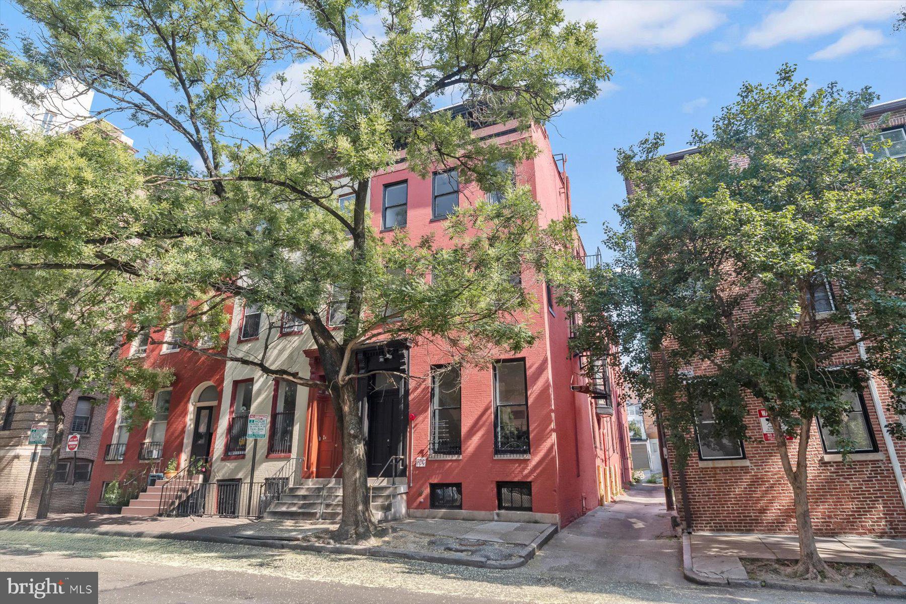 Introducing this exceptional opportunity to own a fully renovated six-unit property in the heart of Baltimore’s vibrant Mount Vernon neighborhood. This four level building includes one 1-bedroom/1.5-bath unit, three 1-bedroom/1-bath units, and two 2-bedroom/2-bath units that were upgraded in 2023 with modern finishes, hardwood and LVP floors, decorative fireplaces, tall ceilings, and abundant natural light that enhance tenant appeal. A private parking space in the rear adds convenience. Each unit features a stylish kitchen with quartz countertops, 42-inch shaker-style cabinets, and stainless steel appliances. Bathrooms include contemporary tile finishes with walk-in or tub-showers. The main level offers two units - Unit 1 has (1 bedroom/1.5 baths) while Unit 2 has (1 bed/1 bath). The second level includes Unit 3 (1 bed/1 bath) and Unit 4 (2 beds/2 baths). On the top floor, Unit 5 offers (1 bed/1 bath), while Unit 6 includes (2 beds/2 baths). All units are equipped with their own electric meters, along with new HVAC systems, water heaters, and in-unit laundry. It may be feasible to combine the four 2nd and 3rd level units into 2 larger two level units. Ideal for investors seeking strong rental income or for an owner-occupant looking to live in one unit while renting out the others. Prime location close to the Walters Art Museum, Mount Vernon Place, the Peabody Institute, Baltimore Symphony Orchestra, and a wide variety of dining, shopping, and entertainment options. Easy access to I-83, Metro stations, and public transportation. Some images have been virtually staged.