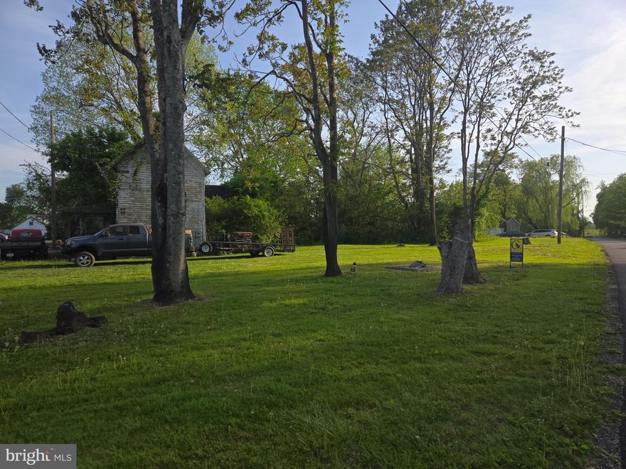 Currently home on the lot.  DO NOT ENTER. Value in the land. This 0.57-acre corner lot in Goldsboro offers a great opportunity for new construction. Property is ready to be tapped into Town of Greensboro's Sewage. Existing well on site, (condition unknown, not hooked up) Current home allows per Planning and Zoning no Excise tax on next build.  Permits for new construction to be applied through town of Goldsboro.