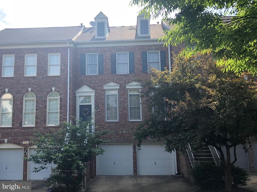 **ACROSS THE STREET FROM VIENNA METRO**Freshly painted top to bottom.   New hardwoods, new carpet throughout.  Spacious and sunliT living, 2 car garage and driveway.  All bedrooms have attached full bathroom. Large kitchen with lots of cabinet space and breakfast table room, walk out to huge deck.  Home is professionally managed, qualifying income is $148,500 using no more than 2 incomes, good credit/landlord history.  Minimum 12 month lease option, mulit-year OK too.  No pets, no smoking.   Available immediately, schedule to see now!