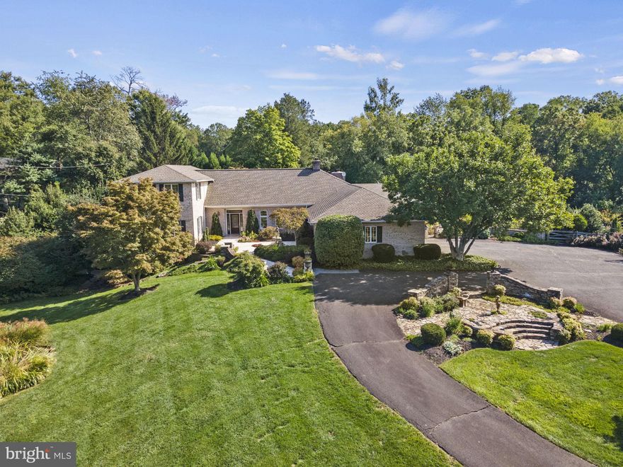 **NEW PRICE** This elegant, Old World European-inspired residence enjoys an incredible 1.5-acre garden setting, enhanced with four seasons of beautiful plantings and trees, statuary, fountains, stone gates, a pond and a loggia. The long-time owners took great care to integrate the indoor living space with the outdoors, where entertaining options abound and where moments of quiet reflection are optimized by the bucolic surroundings. Wrapped in brick, the home opens to an expansive living room with a fireplace and French doors to the covered patio. Designed for entertaining, the circular floor plan offers large primary rooms, 5 bedrooms, 4.5 baths, and a finished lower level. The main level includes a dining room with a butler’s pantry and a spacious kitchen with abundant cabinet and counter space. The kitchen opens to the two-car garage. A flexible room is adjacent to the kitchen, offering an ideal option for a home office or library. The owner’s suite is at the opposite side of the main level, maximizing privacy and featuring an expansive bedroom, a separate sitting room or dressing room, and a spacious full bath. Upstairs there are 3 large bedrooms, including one with a renovated ensuite bath. Another renovated full bath and the two additional bedrooms present the perfect accommodation for the household or guests. The long-time owners of this property even created a special playroom under the eaves …with its own magical door. The lower level features a big recreation room, an extra carpeted room with a large closet, a full bath, extended plumbing for a cocktail bar and great storage space. With a private entry, the lower level is perfect for in-laws, out-of-town guests or an au pair. The best of town and country living, this gardener’s paradise is moments from fine schools, Oakton’s many amenities, and commuting routes. A truly extraordinary residence in an indescribably beautiful setting! This stunning home provides an extensive landscaped exterior that has been visited by local garden enthusiasts and was many times over, included on the cover of Merrifield Gardens magazine. The outside space offers (4) water features, one in the front and three in the back, with multiple patio settings and flagstone retention walls.

Welcome Home!