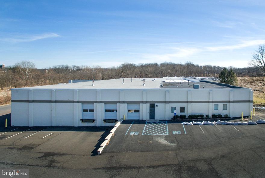 Industrial property in excess of 90,000 sq ft comprised of 5 distinct spaces ranging from 16k - 20k sq ft.  Two suites offer office build-outs, three are solely warehouse.  Multiple options in loading dock and drive-in door configurations.  Mostly 16' ceilings with 20 - 30 foot column spacing.  Partially seller-occupied prior to closing, no existing tenant or income-approach applied to the sale.  Building did not have any refrigeration.  Also included was a small, detached office building of approximately 1,500 sq ft.