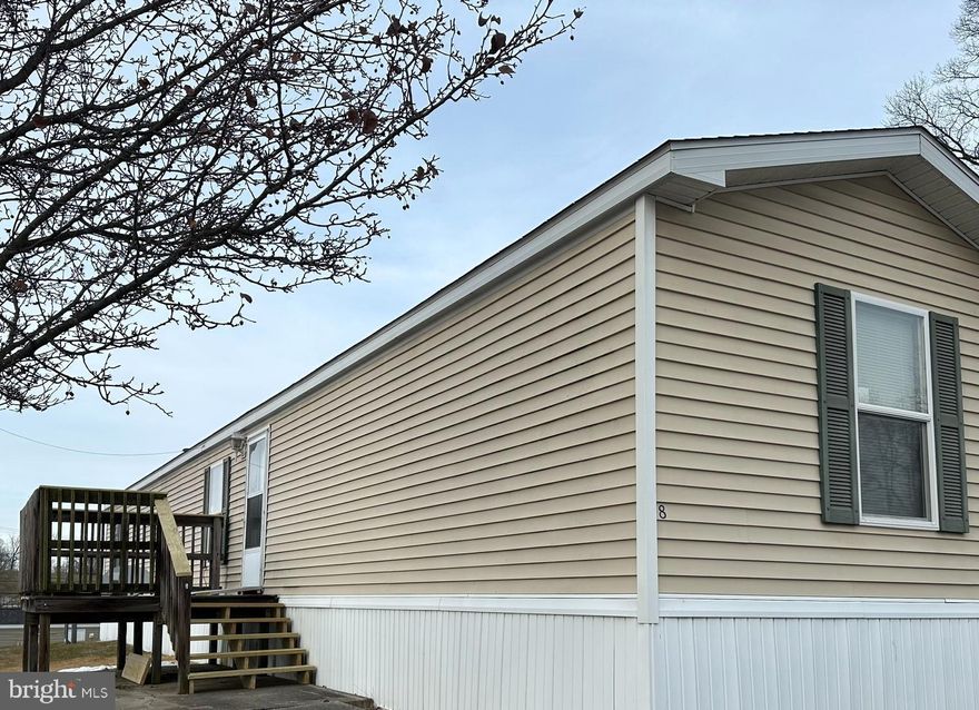 Solid 3-bedroom, 2-full bath home in a small, quiet, well-maintained 50+ park. Efficient propane stove and furnace with forced air heat. Picturesque surroundings and easy access to main roads and amenities. Lot rent is $470/mo and includes water and sewer.