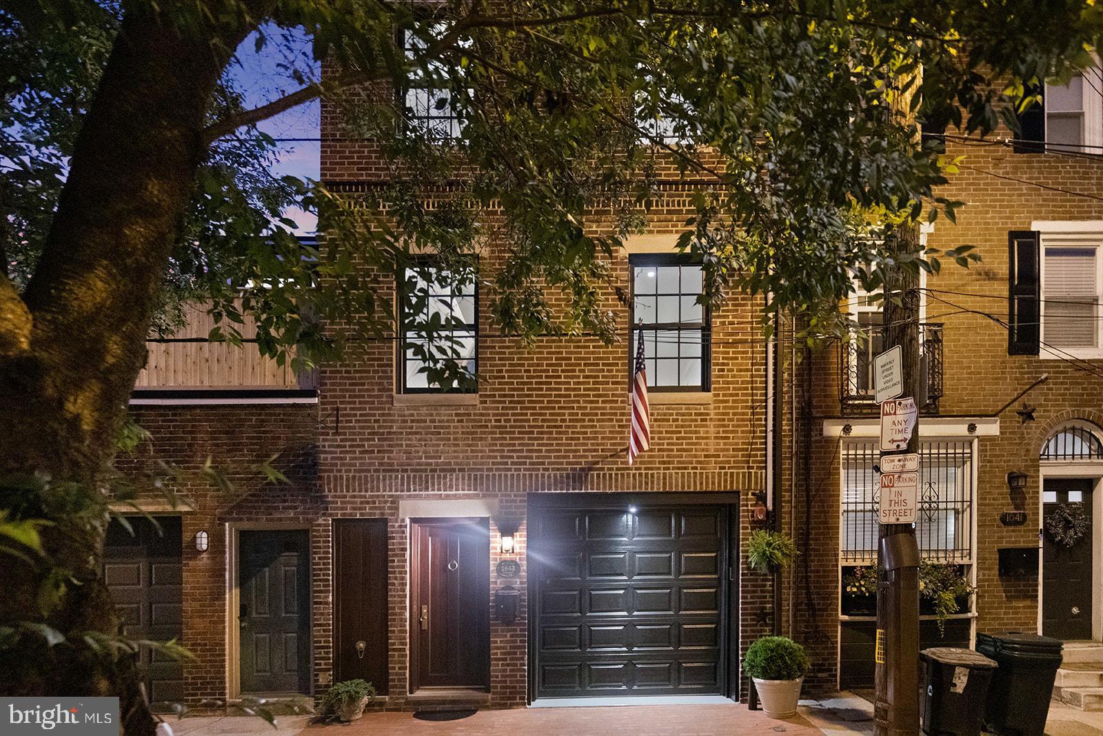 Situated on one of the most quiet, low traffic streets in Rittenhouse is 1643 Waverly, a rare, move-in ready home. For three years, the builder has meticulously prepared this home to
become the ultimate "Turn Key" luxury home– and now it's ready to be yours. This home has a full brick exterior, front, sides and rear to historic standards, with a brick paved sidewalk with concrete base, Marvin Ultimate top of the line windows and rear doors. This home utilizes every square inch of space over the 3 bedrooms, 3 full bathrooms, private attached garage, and two outdoor spaces.
The front door features a custom solid 2.5" thick mahogany entry door set, Baldwin satin brass oiled pin hinges with address plate imported from England. First floor features high end porcelain tile walkway to the rear den/flex room. Off the entry way is the fully finished garage with epoxy floors, with extensive handmade garage cabinetry, fully inset cabinets and custom paint. Towards the back of the first floor is a rear den/home office with pocket inset doors leading to a fully tiled bathroom, with a frameless glass shower with a stone bench. Off this room is a sliding floor to ceiling glass door leading you to the private ground floor terrace, complete with Trex decking, LED lighting and dry deck above.
As you enter the second floor, you’re greeted by the sleek kitchen and island with four person seating. Well thought out design elements such as handmade inset cabinets, crown molding, matte-finish porcelain tile backsplash, quartz countertops, a signature hardware kitchen faucet, and Baldwin Brass Palm estate cabinet knobs truly set this kitchen apart. Surprisingly convenient appliances like a built in full height pantry, pot filler, and Kraus insulated sink with a built in drying rack and cutting board make everyday cooking or entertaining a breeze. Top of the line appliances finish this kitchen, including 36" wolf range and hood, six burner gas stove, 36" subzero fridge, built in Wolf microwave drawer, and Viking dishwasher. Natural light pours through the oversized windows and extended Marvin Ultimate glass doors that lead to your private 2nd floor deck.
Traveling to the 3rd floor, you’ll find two two spacious guest bedrooms with large closets and a full bathroom with beautifully set tile floor and walls, a Kohler soaking depth bathtub, and louvered privacy plantation shutters. Strategically placed in the hallway is the laundry center with storage space and a Sansom stacked unit. Full-lite glass doors lead you up the 4th floor to the spacious primary suite. On this level you’ll find a full bathroom with city sky-line views, tile floor and walls, and a 72" built-in double vanity. The luxurious glass shower stall, low iron crystal clear glass, body sprayer, and custom drain curate the spa like experience in this bathroom. For chilly evenings and romantic nights, turn on your imported European Le Feu-Biofuel eco Ventless fireplace to transform this space into your enclave of relaxation.
Topping off this incredible property is a 10 Year Tax Abatement and prime location just steps away from Rittenhouse Square, fine dining, shopping, retail, doggie parks, festivals, outdoor and indoor cafes.