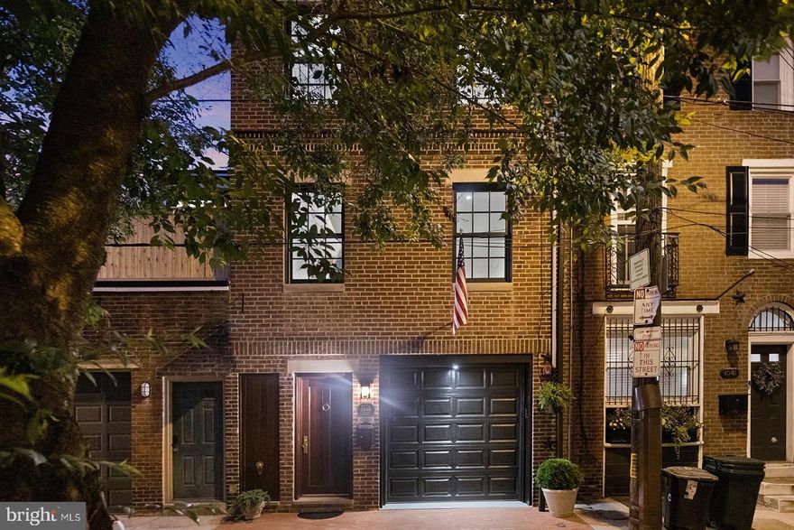 Situated on one of the most quiet, low traffic streets in Rittenhouse is 1643 Waverly, a rare, move-in ready home. For three years, the builder has meticulously prepared this home to 
become the ultimate "Turn Key" luxury home– and now it's ready to be yours. This home has a full brick exterior, front, sides and rear to historic standards, with a brick paved sidewalk with concrete base, Marvin Ultimate top of the line windows and rear doors.  This home utilizes every square inch of space over the 3 bedrooms, 3 full bathrooms, private attached garage, and two outdoor spaces.
The front door features a custom solid 2.5" thick mahogany entry door set, Baldwin satin brass oiled pin hinges with address plate imported from England. First floor features high end porcelain tile walkway to the rear den/flex room. Off the entry way is the fully finished garage with epoxy floors, with extensive handmade garage cabinetry, fully inset cabinets and custom paint. Towards the back of the first floor is a rear den/home office with pocket inset doors leading to a fully tiled bathroom, with a frameless glass shower with a stone bench. Off this room is a sliding floor to ceiling glass door leading you to the private ground floor terrace, complete with Trex decking, LED  lighting and dry deck above.
As you enter the second floor, you’re greeted by the sleek kitchen and island with four person seating. Well thought out design elements such as handmade inset cabinets, crown molding, matte-finish porcelain tile backsplash, quartz countertops, a signature hardware kitchen faucet, and Baldwin Brass Palm estate cabinet knobs truly set this kitchen apart. Surprisingly convenient appliances like a built in full height pantry, pot filler, and Kraus insulated sink with a built in drying rack and cutting board make everyday cooking or entertaining a breeze. Top of the line appliances finish this kitchen, including 36" wolf range and hood, six burner gas stove, 36" subzero fridge, built in Wolf microwave drawer, and Viking dishwasher. Natural light pours through the oversized windows and extended Marvin Ultimate glass doors that lead to your private 2nd floor deck. 
Traveling to the 3rd floor, you’ll find two two spacious guest bedrooms with large closets and a full bathroom with beautifully set tile floor and walls, a Kohler soaking depth bathtub, and louvered privacy plantation shutters. Strategically placed in the hallway is the laundry center with storage space and a Sansom stacked unit. Full-lite glass doors lead you up the 4th floor to the spacious primary suite. On this level you’ll find a full bathroom with city sky-line views, tile floor and walls, and a 72" built-in double vanity. The luxurious glass shower stall, low iron crystal clear glass, body sprayer, and custom drain curate the spa like experience in this bathroom. For chilly evenings and romantic nights, turn on your imported European Le Feu-Biofuel eco Ventless fireplace to transform this space into your enclave of relaxation. 
Topping off this incredible property is a 10 Year Tax Abatement and prime location just steps away from Rittenhouse Square, fine dining, shopping, retail, doggie parks, festivals, outdoor and indoor cafes.