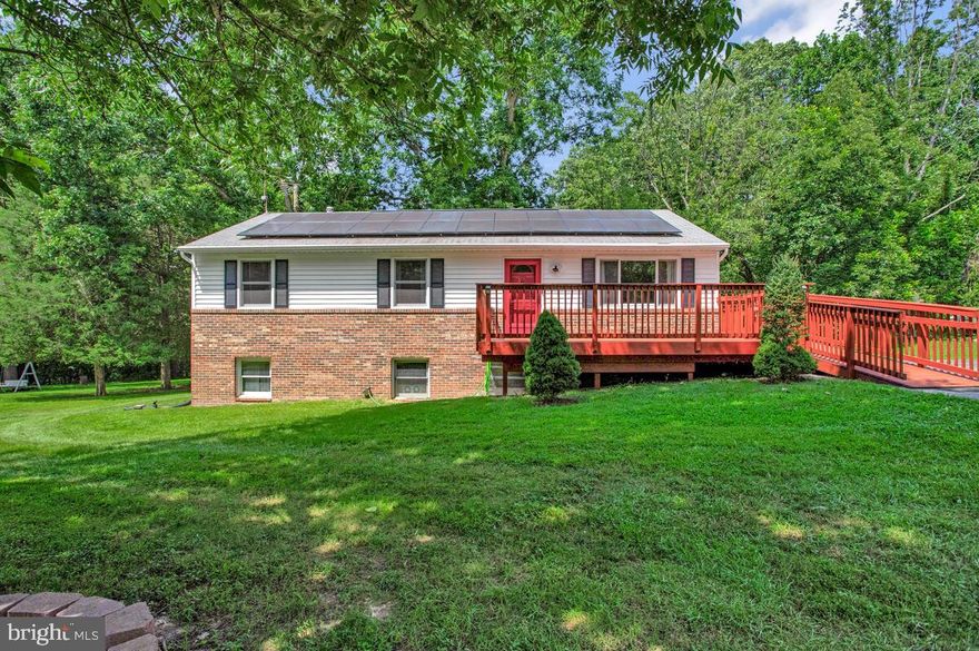 Cute 3 bedroom rambler sitting on a mostly wooded 2.67 acre lot  located in Huntingtown offers  a spacious country kitchen w/ dining area combo . 
Main level  includes fresh paint, new carpet, newer windows & front door, newer floors in dining area, hallway, and living room. 
 Also all 3 bedrooms & 2 full baths, including laundry area are all on main level.
Partial finished  lower level has a basement apartment, that includes a kitchenette w/ table space, living room/ bedroom combo.  Unfinished walk -out side of basement does provide the 3rd full finished bathroom and includes washer/ dryer hookup, lots of additional storage and could be finished to provide additional living space for everyone.
Nice size front deck has plenty of room for your cozy rockers.  Back deck includes a gazebo & hot tub, with plenty of room for all your summer cookouts and a great place to relax.
Yard has plenty of  space for all your outdoor hobbies and provides established trees, landscaping, fruit trees, and backs up to your woods.
Solar panels are fully paid off with no additional fees. Yay!
Property is conveniently located right off of  Rt 4 and located near local shopping, dining , boardwalks, beaches, libraries, and so much more. 
Less then a hour  commute to Pax River Navel base,  Andrew’s Air Force,  Annapolis, DC, and Baltimore but with all the Calvert  has to offer.
