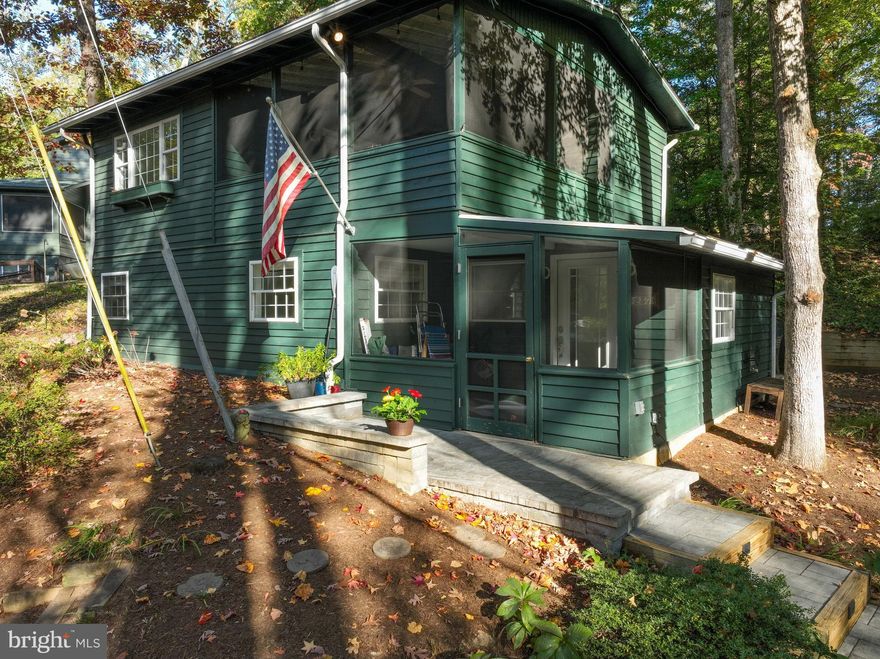 Call Listing Agent, Amy Van Slyke for showing.  Also call listing agent for gate code access.  ** Exciting opportunity in Sherwood Forest!!  Completely renovated 3 BR, 2 Bath Home with ample 3 -4 car parking!  Enter the front door through the quaint screen porch.  The front hall opens to a spacious dining room area.   Beyond is the open kitchen, beautifully designed with subway tile backsplash, state of the art cabinetry, marble counters, rustic wood shelves and all new stainless appliances.  The kitchen opens to the  first floor living room centered by the original Sherwood fireplace updated with a country stone surround and shiplap frame.  Opposite and behind a stylish sliding barn door is the first floor bedroom or office - your choice!  The fully renovated first floor full bath and laundry room are found off of the hall leading to the back entrance where you will find the quaint outdoor dining patio and BBQ.  The second floor boasts ANOTHER living/family room with a sliding glass door opening to the LARGE screen porch with a tree-house feel - great for entertaining or slumber parties!!  Two more bedrooms, and a sleek double-vanity bathroom upstairs make for plenty of room for family and guests. Furnished sale is an option.  ** Sherwood Forest is a gated Community of 341 homes, situated on the Severn River.  It's peninsula shape and sweeping elevations create gorgeous vistas of the surrounding creeks, river and the Severn River Bridge.  **  Walk along the 2 mile waterfront road and take in the mouth of the Chesapeake Bay.  ** Bike or hike the 5 miles of outer Forest trails.  Most residents prefer their Golf Carts for easily navigating the scenic hills.  ** Established in 1915, the Community is anchored by a grand Clubhouse which overlooks the Community Pool - and houses a Dance Hall, Duckpin Bowling Alley, A Stage for Community Productions, a grand Stone Fireplace, Library, and a Nature Lab for educating children about Chesapeake life.  Members enjoy many events at the Clubhouse including Community Dances, Anniversary Celebrations, and Cultural Arts Presentations.  The Clubhouse is available to members to rent for Weddings or Private Events.  ** The Sherwood Forest Market serves ready-made meals and stocks staples for your cottage kitchen. ** Sherwood is known for it's Children's Summer Camp where your children learn numerous activities Sailing, Swimming, and Archery among others.  ** Other outstanding amenities are the 9-Hole Golf Course, Tennis Courts, Pickleball Courts, Basketball Court, Badminton and Volleyball Field, Softball Field, and a Lacrosse/Soccer Field. ** For the Chesapeake lovers, Sherwood has a Marina, Small Piers and a Main Pier where river swim-meets are held.  ** Make memories with events like the 3rd of July Fire fireworks, 4th of July Parade and the Annual "not to be missed" Corn Roast. ** Sports tournaments abound for children and adults alike - including tennis, golf and pickleball. ** With a purchase of a home, Sherwood Forest requires a one-time $20,000 Club Membership Fee.