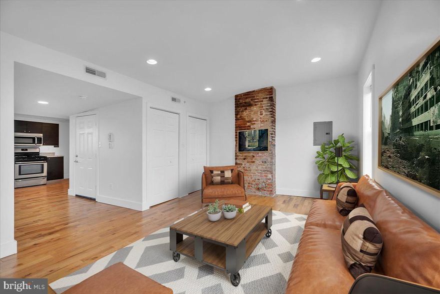 Welcome to 1014 N 4th St, Unit #2, a charming 2-bedroom, 1.5-bathroom condo in the heart of Philadelphia's vibrant Northern Liberties neighborhood. Owner willing to sell the building (3 units) Inquire for pricing! This spacious unit offers a perfect blend of modern convenience and classic charm, featuring beautifully maintained hardwood floors throughout. The open and airy living spaces provide ample natural light, creating a warm and inviting atmosphere. The kitchen is thoughtfully designed with sleek granite countertops and plenty of cabinet space, making it ideal for both casual cooking and entertaining. The bathroom is elegantly finished with stunning tub-to-ceiling tile. Plus, the convenience of in-unit laundry makes city living even easier. To top it off, a brand-new roof was recently installed and comes with a 10-year warranty, ensuring peace of mind for years to come. Located in one of Philadelphia’s most sought-after neighborhoods, this condo puts you just steps away from some of the city's best dining, shopping, and entertainment options. Enjoy brunch at the beloved Café La Maude, known for its French-Lebanese-inspired menu, or grab a bite at Honey’s Sit ’n Eat for a classic comfort meal. Spend your weekends at the lively Piazza, where you’ll find an array of boutiques, bars, and community events, or take a stroll down 2nd Street to explore its eclectic mix of restaurants and nightlife. For outdoor enthusiasts, Liberty Lands Park offers green space and a welcoming community atmosphere. Commuting is effortless with easy access to SEPTA’s Market-Frankford Line at both Spring Garden and Girard Stations, providing a quick connection to Center City and beyond. Multiple bus routes also service the area, making travel convenient and accessible. Experience the best of city living in this stylish and well-located condo—don’t miss your chance to call 1014 N 4th St, Unit #2 your new home! *Building also available for sale as a Triplex - please inquire with the listing agent for more details.