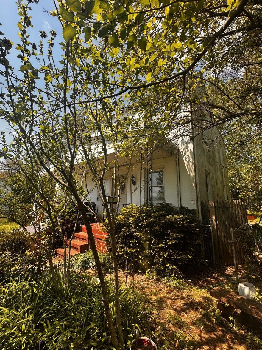 Opportunity awaits for buyers looking to build equity with a little vision and effort. This home is currently configured as a 3-bedroom, 2-bath property, with the original living room converted into a convenient main-level bedroom—easily restored to its original use if desired.

The main level features a galley kitchen with rear access to a covered porch overlooking a fenced and landscaped backyard—perfect for outdoor enjoyment. The property also offers a landscaped front yard designed for ease of maintenance.

Upstairs, you’ll find two comfortable bedrooms and a full hall bath with an oversized shower.

The full lower level offers great expansion potential and includes a laundry and storage area, an unused half bath, and a walk-up stairwell to the rear yard.

Additional highlights include natural gas forced-air heating, central air conditioning, and a natural gas water heater. The home is priced with updates in mind, making it an excellent opportunity for customization.

Seller may require a short rent-back period to transition into their next home, which is already under contract.