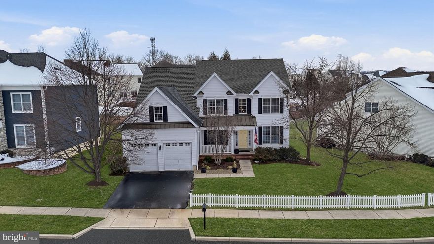 **Open Houses Canceled! Home is Under Contract** Welcome to this absolutely stunning colonial in the highly sought-after Overlook at Newtown community! Perfectly positioned among scenic walking trails that lead directly to the charming shops and dining of Newtown Borough, this beautifully updated home offers a rare blend of privacy, convenience, and neighborhood charm. A welcoming front porch overlooks tranquil preserved space, creating a peaceful setting while still enjoying the warmth of community living. Inside, a dramatic two-story foyer greets you with soaring ceilings, crown molding, and rich hardwood flooring that flows throughout the main level. The updated kitchen seamlessly opens to the inviting family room, where detailed ceiling trim and a cozy gas fireplace create the perfect gathering space. The thoughtfully designed first floor also features a formal living room, dining room, spacious private office with French doors, a powder room, and a convenient main-level laundry and mudroom complete with a large closet for optimal organization. A sleek, modern glass stair railing leads to the upper level, offering open views of the family room and kitchen below. Upstairs, you’ll find four generously sized bedrooms and two full baths. The serene primary suite provides a true retreat, complete with an expansive bonus storage area ready for your vision, whether transformed into a sitting room, home office, dressing area, or additional custom space. The fully finished basement is a true showstopper! An entertainer’s dream featuring a stunning curved bar, expansive seating and lounge areas, a workout room, additional storage, and a convenient half bath. Floor-to-ceiling insulation enhances comfort and efficiency, complemented by two-zone heating and air conditioning systems. Gas utilities, public water, and public sewer add to the home’s overall efficiency and ease of living. As original owners, the sellers thoughtfully selected premium builder upgrades, including an extended two-car garage with extra storage space and a four-foot bump-out in the family room. All of this within walking distance to restaurants, shopping, the library, parks, in Council Rock School District, and just minutes from the train station, the I-95 corridor, and Route 1 for easy commuting. This exceptional home truly offers the best of location, luxury, and lifestyle. Welcome home! Showings begin at Thursday's Open House at 5pm.