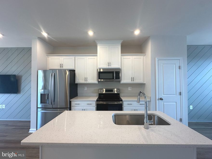 Welcome home to comfort, convenience, and beautiful mountain views at Presidents Pointe.
This move-in-ready townhome by Stanley Martin Homes offers the perfect blend of space, efficiency, and low-maintenance living—ideal for today’s busy families. With three finished levels, 9-foot ceilings, and large windows throughout, the home is filled with natural light and designed for easy, comfortable living.
The open-concept main level features a modern kitchen with a spacious island, quartz countertops, beautiful cabinetry, and stylish finishes inspired by model home selections—perfect for family meals, homework time, or gathering together at the end of the day. The seamless flow into the dining and living areas creates a warm and inviting space for relaxing or entertaining. Step outside onto your private deck and enjoy peaceful mountain views and fresh air.
Built with energy efficiency in mind, this home helps support comfortable living and lower utility costs year-round. Thoughtful design and newer construction also mean less upkeep—giving you more time to enjoy your home instead of maintaining it.
Families will appreciate the attached garage and extra-long driveway offering plenty of space for parking, and guests.

Located in the Eastern Panhandle’s only truly walkable neighborhood to shopping and dining at Potomac Marketplace, daily errands and casual outings are simple and convenient. Downtown Charles Town is just minutes away, offering local restaurants, boutiques, and community events.

For commuters, the location provides easy access to Routes 9, 15, 7, and 340—making travel to Virginia and Maryland smooth and manageable.

Small pets are welcome. Income X3 the rent. Tenant pays all the utilities.  Contact owner for showings: Lali 202-459-8555.
Apply online: https://apply.link/OZA99so