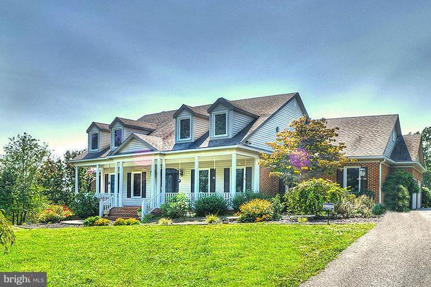 A showcase for imported marble, granite, exotic hardwood and terracotta, this exquisite residence is amazing in whole as well as in every luxurious detail. Three spacious levels, five bedrooms including two masters, 2-story living room, heated pool and an outdoor kitchen are just a few features . Excellent workmanship throughout. Thirteen private wooded acres with spectacular mountain views.