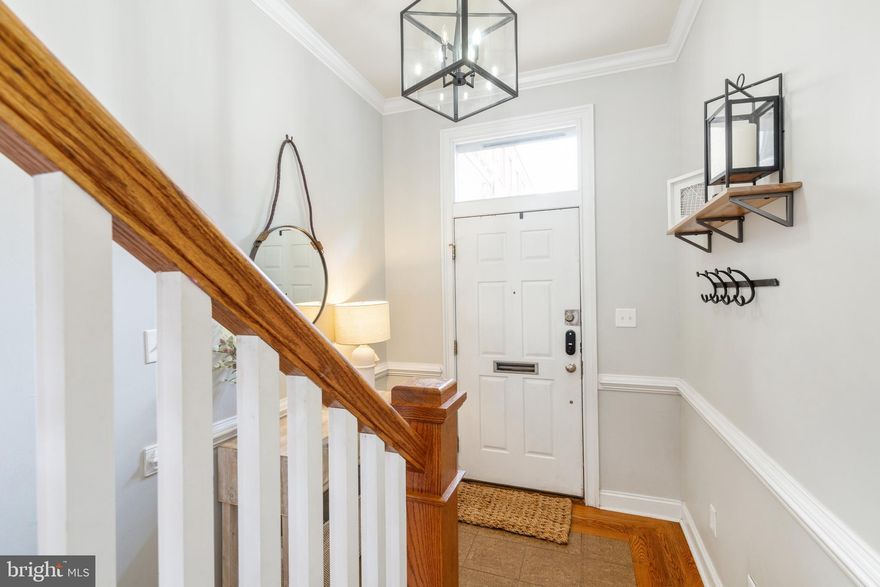 Welcome to 652 N. Sydenham! This stunning 4 bedroom/3 bath end unit with garage parking is conveniently situated on a tranquil tree-lined street in the heart of Philadelphia's vibrant Fairmount neighborhood. At first sight you will love the beautifully maintained brick facade and warm, quiet neighborhood feel. 

Upon entering this gorgeous home, you'll be struck by its elegant charm and modern upgrades throughout. The welcoming entrance boasts stone floors and interior access to your oversized garage with storage. A main level bedroom with a full bathroom and  lovely patio and garden completes the  ground level. Continue up the extra wide stairs to the spacious living and dining area which is complemented by an abundance of natural light that provides a bright inviting atmosphere perfect for relaxing and entertaining. The kitchen, which was renovated in 2018,  features stylish fixtures, stainless steel appliances,  ample cabinet space and gorgeous quartzite counters with barstool seating for three. Behind the kitchen is the well thought out built in workspace and just off the kitchen is a deck which is perfect for grilling while taking in the skyline views.

On the third floor there are two oversized bedrooms, each with its own individual character, custom closet space and lots of natural light. This level also has a full bath and a large laundry room with a side-by-side washer and dryer. 

The fourth floor is dedicated to the expansive primary bedroom featuring extra high ceilings, floor to ceiling french doors with a Juliet balcony and light coming in through the skylight above the stairs. Your spa-like bathroom features double sinks with a marble top, large jacuzzi tub and a 5-jet shower.  There is plenty of space for your clothes in the fully outfitted walk-in closet. 

Additionally, the basement is fully finished and can be used as a gym, office, playroom, media room and more! All this plus 3-zoned HVAC, a central vacuum, camera and security systems and a keypad entry add to this well thought out  home!

At the end of the street is a community garden and for a tax deductible $40 per year you get to enjoy your own plot - truly an oasis in the city!

Located just a short distance from shops, restaurants, parks, and public transportation, this property is perfect for anyone looking for a prime location with neighborhood charm. Don't miss your opportunity to own this truly exceptional move in ready home!