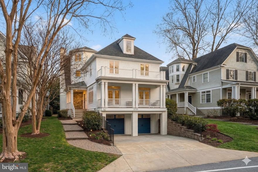 Enjoy this magnificent home, complete with an elevator, just minutes from downtown Bethesda, the Capital Crescent Trail, Little Falls Park, and more. Ideally located in the heart of Bethesda, 6700 Fairfax Road offers expansive living and entertaining space across four generous levels. Featuring six bedrooms, five-and-a-half bathrooms, a gourmet kitchen, and a two-car garage, this is a rare opportunity within the highly sought-after BCC High School cluster.

An inviting front porch sets a warm and welcoming tone upon arrival. Inside, a gracious entry foyer with an open staircase leads to beautifully appointed living spaces, where sun-filled rooms, soaring ceilings, and refined finishes create an effortless sense of sophistication. The main level is designed for both everyday living and elegant entertaining, with formal living and dining rooms bathed in natural light and French doors opening to a charming front porch.

At the center of the home, the thoughtfully designed gourmet kitchen features an oversized island, Viking range, Sub-Zero refrigerator, and a bright breakfast area with French doors to the backyard. A butler’s pantry with a wine refrigerator, along with a walk-in pantry, provides exceptional storage and convenience. Just beyond, the spacious family room showcases a striking stone mantle and wood-burning fireplace, creating a comfortable yet refined gathering space.

Upstairs, the primary suite offers a true retreat, highlighted by expansive windows, custom built-ins, a generous walk-in closet, and a beautifully updated bath with a soaking tub, dual vanities, and a walk-in shower. Two additional bedrooms share an updated Jack-and-Jill bathroom, while a fourth bedroom with dual closets is served by an updated hall bath. The fourth level adds incredible flexibility with a large fifth bedroom, full bath, and a versatile bonus space ideal for a home office, lounge, or playroom. The lower level features a spacious recreation room with LVP flooring, along with a sixth bedroom and full bath, perfect for guests or extended stays.

The outdoor setting is equally impressive, offering a private, fenced backyard with a stone patio, built-in grill, fire pit, and mature landscaping for added privacy. Throughout you’ll find thoughtful updates and modern finishes, creating a home that feels both timeless and turnkey. With its exceptional design, prime location, and elevated finishes, this residence offers a seamless blend of comfort, convenience, and style in one of the most desirable locations!