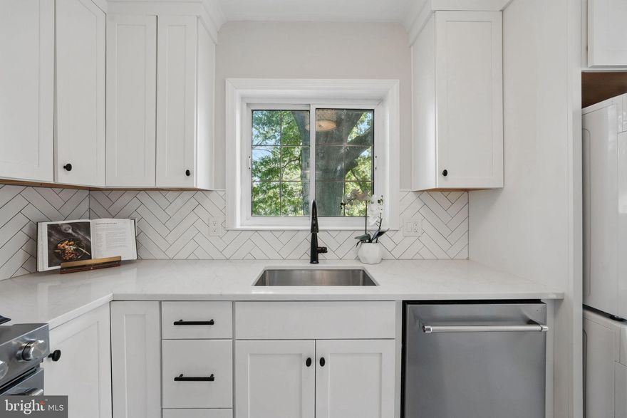 Step into this freshly updated 805 sq ft 1-bedroom condo in historic Parkfairfax, ideally situated on a quiet end unit facing a spacious courtyard. The entire home has been freshly painted and thoughtfully upgraded for modern living, featuring new light fixtures and ceiling fans in both the living room and bedroom, thermal windows, and a tiled entryway for added style and durability. The fully remodeled kitchen features semi-custom cabinetry, quartz countertops, a gas stove, herringbone tile backsplash, and a vented over-the-range microwave. You'll also love the new refrigerator, dishwasher, touch-activated sink faucet, and in-unit stackable washer and dryer—all seamlessly integrated for convenience. The updated bathroom offers a reglazed cast iron tub, new shower tile, marble shower niche, new toilet, vanity, and medicine cabinet. Additional highlights include: End unit privacy with only one neighbor beside. Covered front porch, perfect for container gardening or relaxing—even in the rain. Abundant natural light with 10 windows throughout the unit. Convenient parking options: adjacent lot, street, or nearby Mt Eagle Place. DASH bus stop directly in front. Easy access to the 395 express on-ramp—ideal for commuting to the Pentagon, Reagan National Airport (DCA), and DC. Walk across the 395 pedestrian bridge to Shirlington’s shops, restaurants, and entertainment. Just 15 minutes to Old Town and Del Ray. Extremely pet-friendly community—no breed or size restrictions (2 pets allowed per unit). Condo fee covers water, sewer, gas, and trash and an array of amenities, including three swimming pools, tot lots, pickleball/tennis courts, woodland trails, bike storage, car wash lot. This move-in ready condo combines comfort, style, and unbeatable access to everything Northern Virginia and DC have to offer! You do not want to miss it!