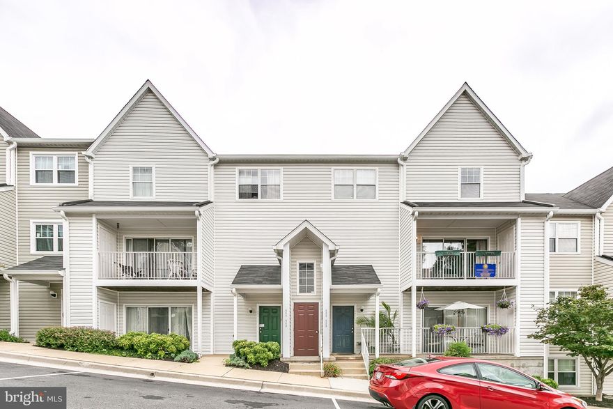 Incredibly convenient updated condo ready for you!  Perfect when you want the ease of condo living with a semi private entrance.  Secure exterior door.  When inside walk up the flight of stairs to the front door.  2 bedrooms 1.5 baths.  This unit offers hardwood floors, open floor plan, white kitchen, stainless appliances, balcony overlooking the neighborhood.   Freshly painted, updated HVAC.  Full size washer and dryer on the bedroom level.  2 car parking with permit.  Close to everything!  Don't miss this one!