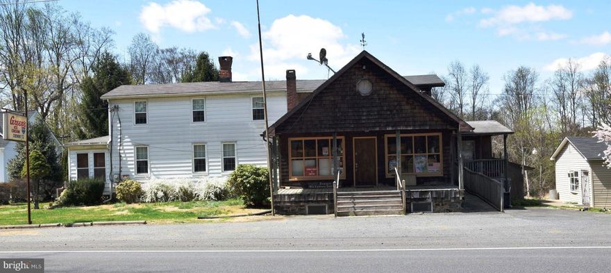 To be offered for Sale at Public Auction on Friday, June 13, 2025 at 12 pm by Patrick S. O'Neill, Inc., Auctioneer, in cooperation with O'Neill Enterprises Realty. The list price is one-half of the assessment value and is not the anticipated sale price.  $ 25,000.00 Contract Deposit required.  Settlement by August 13, 2025.  Circa 1883 frame dwelling with an attached retail store that received a major addition in 1988 with a total improved area above grade to approximately 5000 sq. ft.  The 2-story dwelling contains approximately 2800 sq. ft. of living area with 3 bedrooms, 1 bathroom, large kitchen and living room.  Access to the attached retail store is accessible through a pocket doorway or from the main entrance from the front porch.  The retail store is approximately 1600 sq. ft. with built-in counters and shelving, a restroom, and second entrance in the rear of the store.  The apartment above the retail store contains 1 bedroom, 1 bathroom, and a 400 sq. ft. kitchen/living area.  There is a separate outside entrance to the apartment and access from within the retail store.  There is also a 400 sq. ft. free-standing retail space with electric and heat.  Please see the MLS documents for detailed brochure and auction terms.