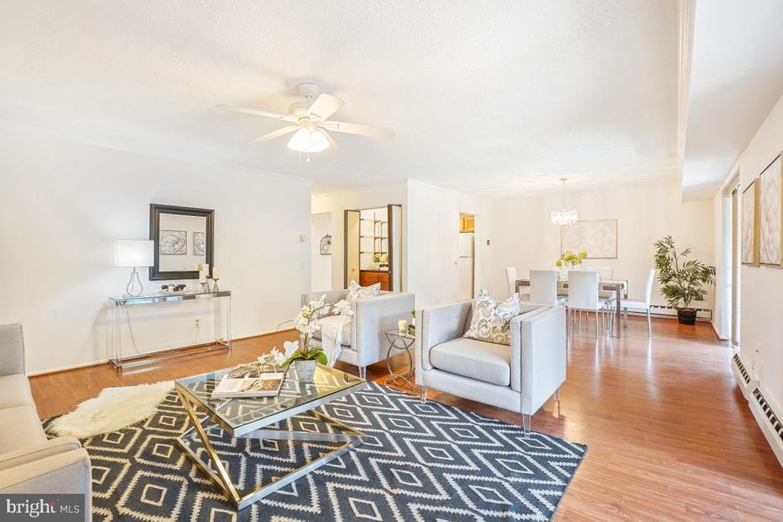 Gorgeous, renovated condo in Leisure World, a 55+ community that lives like a resort! This spacious unit boasts a newer kitchen with tons of storage space, including pull-out shelves and a pantry! The living area offers an open floor plan and includes a terrific wet bar! There are 2 sets of sliding glass doors that lead to a long balcony that overlooks trees. The bedrooms and bathrooms are large and offer generous closet and storage space.  Freshly painted, this home is ready for immediate occupancy. Did I mention the reserved carport space and additional storage?! All of this, plus the incredible amenities of Leisure World (2 clubhouses 3 restaurants, indoor and outdoor pools, awesome fitness center, 24-hour security, 18-hole golf course, billiards and card room, wood shop, library, auditorium, art studio, pickleball courts, community garden and MedStar Medical Health Center) make this home an unbeatable value in today's market!