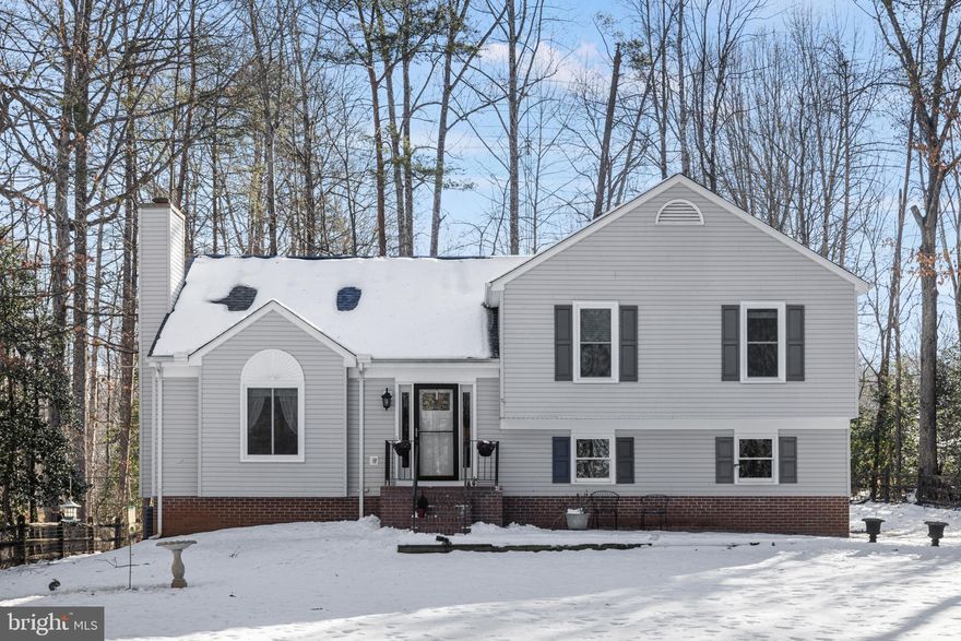 Three bedrooms 3 full baths. Family room features luxury vinyl plank floors, vaulted ceiling and wood-burning fireplace.  Kitchen with stainless steel range, dishwasher and refrigerator.   Luxury vinyl plank floors on stairs and in hallway.  Large fenced in private front yard and large rear deck to enjoy those summer evenings.  The wonderful community of Lake Wilderness offers a pool, playgrounds, lake and so much more.  Located in the sought after Riverbend High School district of Spotsylvania County Schools.  Easy to get to Rt 3 towards Fredericksburg or Locust Grove and beyond.  You will absolutely love to call his home.