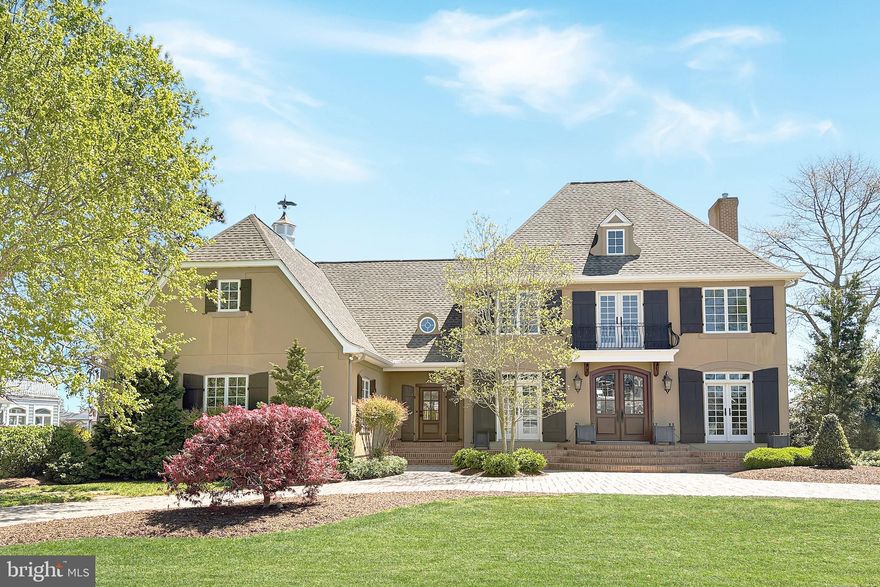 Nestled within the prestigious Rehoboth Beach Yacht and Country Club, this exquisite Mediterranean-style residence offers an unparalleled lifestyle defined by luxury and tranquility. The property boasts breathtaking views of Bald Eagle Creek. With 98 feet of waterfrontage, indulge in direct access to navigable canals, ideal for boating enthusiasts. The private dock, equipped with an electric hoist, enhances your waterfront experience, allowing for effortless days on the water. Step outside to discover a stunning in-ground gunite pool, surrounded by lush landscaping, creating a private oasis for relaxation and entertainment. The elegant design is complemented by two inviting gas fireplaces, perfect for cozy evenings. With a side-entry garage accommodating three vehicles, convenience meets sophistication in this exceptional home. Experience the epitome of coastal living in this luxurious retreat.