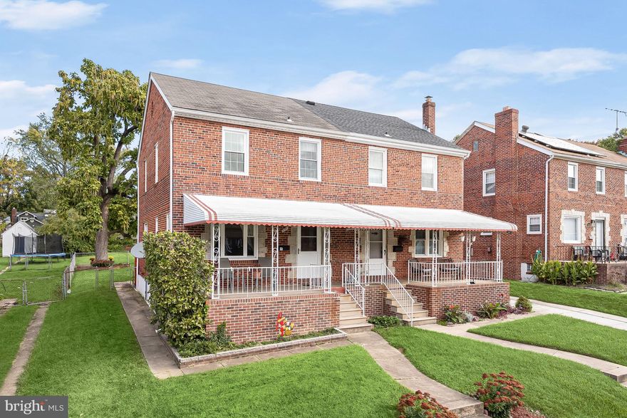Beautiful brick exterior, semi-detached townhome in the Parkville community of Baltimore!  Centrally located for easy access to shopping, dining, and entertainment with  US-1, I-695, and I-95 moments away for travel to the Inner Harbor, Hampden, or an adventure to Washington D.C.  Enter into the open main level by way of the front porch, ideal for morning coffee, and experience a neutral color palette that highlights the hardwood floors and guides you into the formal dining room featuring a chair railing and an abundance of light.  Let the kitchen inspire delectable delights boasting a decorative backsplash, a breakfast bar, stainless steel appliances, and entry to the sizable rear deck and fenced yard perfect for hosting any special occasion.  Relax and unwind in any of the three spacious upper-level bedrooms and an updated hall bath with modern upgrades and marble-inspired ceramic tile.  The lower level family room offers a cozy atmosphere with plush carpet, beadboard wainscoting, a chair railing, and a powder room.  Updates:  Upstairs Bath, Lower Level Bath, Hot Water Heater, Range, Dishwasher, Washer, Dryer.