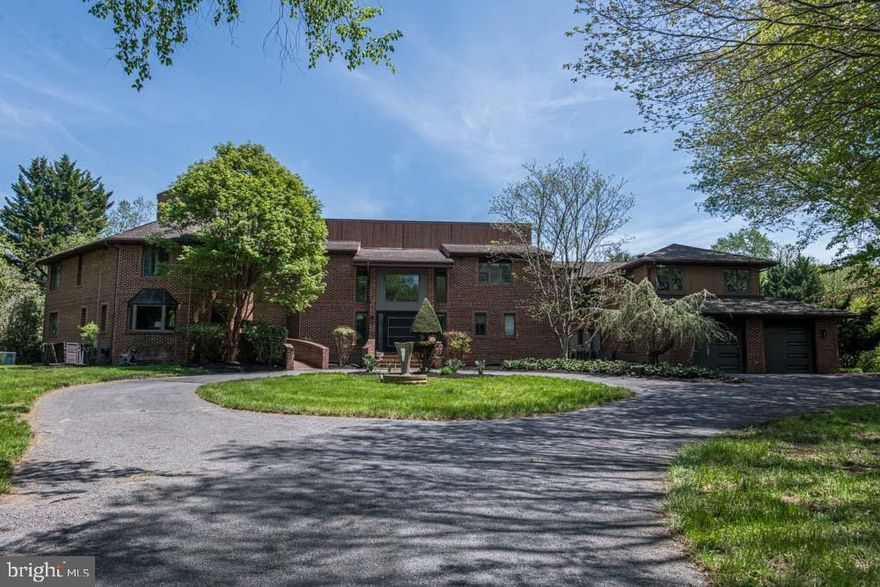 Exquisite Estate on 4.5 Private Acres in Reisterstown’s Premier Community. Welcome to this magnificent 8,000+ square foot custom-built residence designed for multigenerational living, the home boasts a main-level in-law suite with a private full bath—ideal for guests or extended family. A rare opportunity to own a private retreat that blends timeless elegance with resort-style living. Add your personal touch to make it your own! Nestled at the end of a quiet cul-de-sac and surrounded by 4.5 lush, manicured acres, this stunning home offers 6 bedrooms and 6 Full & 1 Half luxurious bathrooms, designed with both entertaining and everyday living in mind. Step inside to soaring ceilings, rich hardwood flooring, and a seamless flow of grand yet inviting living spaces. The heart of the home features a gourmet chef’s kitchen, sun-drenched breakfast area, and an expansive great room with oversized windows overlooking the spectacular backyard oasis. Outdoors, indulge in resort-style amenities, including a sparkling 42,000gal in-ground pool, multiple patios and elevated decks, your own private Par 3 putting green, Garden (Veg, herbs & berries) plus a Custom 10x15 run Chicken Coop, and Plum & Apples Trees—perfect for relaxing afternoons or entertaining on a grand scale. The grounds are a masterpiece of tranquility and seclusion. Car enthusiasts will appreciate the oversized  4-car attached side-entry garage with access to work on the car underneath for oil changes & inspections as well as the additional 2-car front-entry garage, offering ample space for your collection or workshop needs. This exceptional estate is more than a home—it's a lifestyle. A rare combination of luxury, privacy, and prestige just minutes from everything, yet a world away. Schedule a showing to see this magnificent home and everything it has to offer.