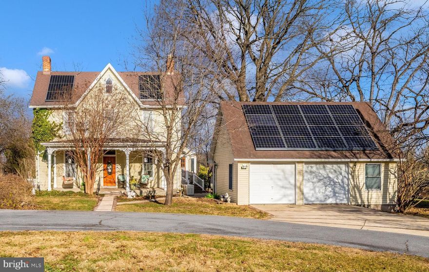This home is loaded with charm and character.   Lots of room to roam with almost 3 acres.  Enjoy the large yard space surrounding the home with a mainly flat lot that includes a mix of woods and yard with a scenic view of Catoctin Mountain as a bonus. This colonial has  4 bedrooms and 2.5 baths with a detached 2-car garage and circular driveway. The primary bedroom has an attached enclosed porch.  Plenty of room for entertaining with a living room, sitting room, eat in kitchen with breakfast area and a large dining room.  Off of the kitchen is a large pantry area with washer and dryer and 1/2 bath.  2 propane fireplaces.     Plenty of storage with 3 storage sheds. No HOA.  Home has a back-up generator that runs on propane gas. The home is located just outside of Frederick City.