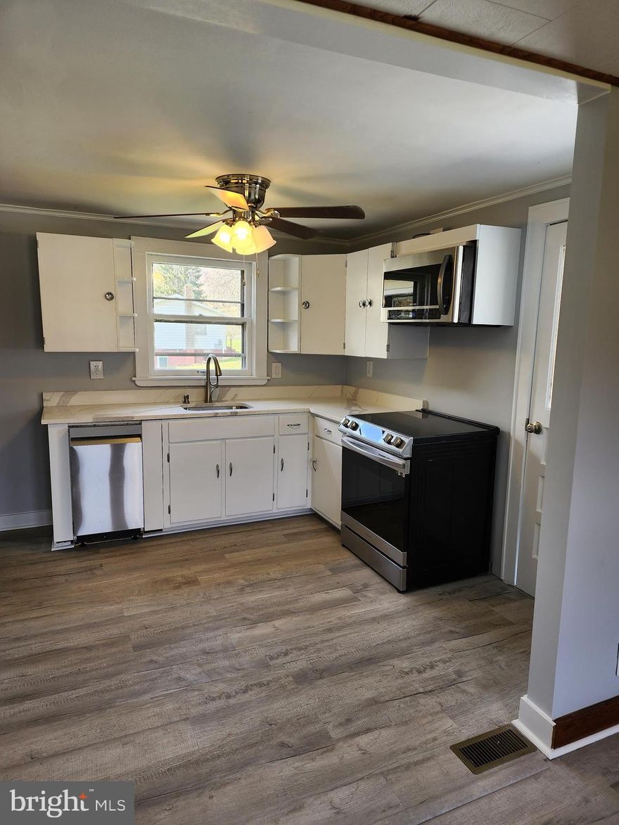 Home has new CAC, new gas furnace. Kitchen has new Samsung stainless steel appliances. Large deck off kitchen. Vinyl plank flooring in kitchen and dining room. new carpet in bedrooms and living room. Fresh paint and new ceiling fans. Great mountain views, quiet location.