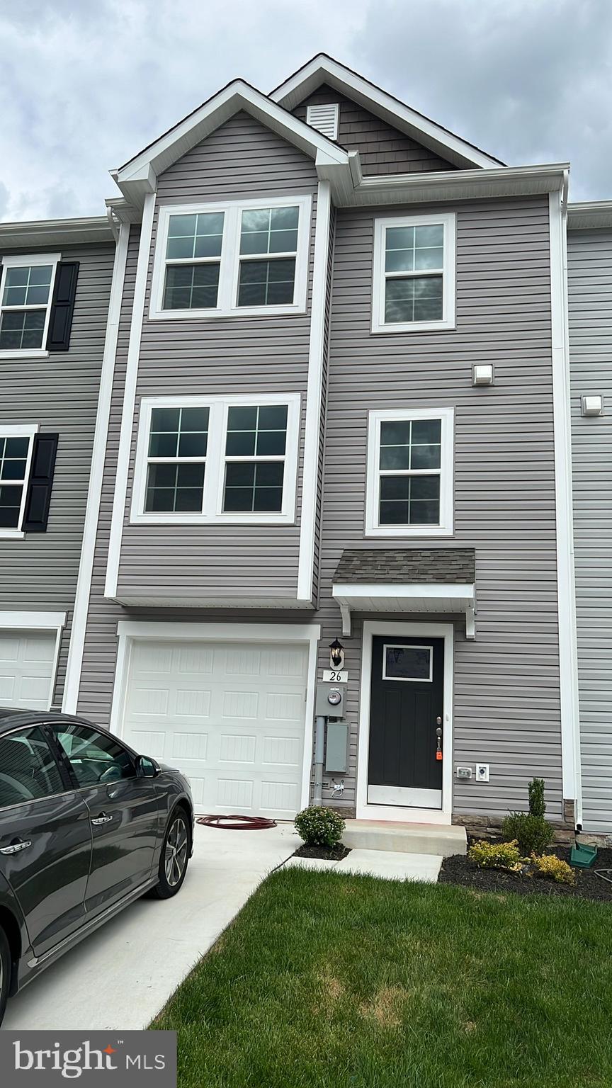 Bigger DRB Homes Overlook at Riverside - Next to Children / Dog Park - Brand New Town Home 4 Bed Rooms, 3.5 Bath, Upon entry of this wonderful townhome, a finished rec room (can use as a 4th Bed Room) with a full bathroom. The main level offers luxury vinyl plank flooring throughout and a spacious living room with a powder room. The eat-in kitchen features an island, Quartz countertops and stainless steel appliances. The spacious primary suite features a generous walk-in closet and an en suite bath with a dual sink vanity and an oversized seated shower. Two secondary bedrooms & full bath, a linen closet and a centrally located laundry complete the upper level! Set in a wonderful new community, Dog Park, Children's park, Basket Ball Court, Tennis Court, and Recreation sit up area are free amenities. In a prime location for I-81, Rt 11, I-70 commuters, mountain views, walking distance to shopping, and restaurants, access to Spring Mills schools, and close to interstate just minutes from the MD line. This rental may not last long.