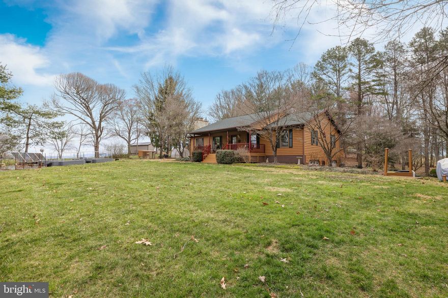 Looking For A Beautiful Secluded Homestead Opportunity Only Minutes South Of Bridgewater?! This 3 Bed 2 Bath Home Offers Raised Gardens W/ Self Watering System, Greenhouses, Hoop Coops, Hutches, Berry Bushes and More! You Can Enjoy A Summer Evening On The Spacious Rear Deck, Or A Chilly Morning Next To The Fireplace Only Minutes From B-Water/H-Burg, & Weyers Cave. Large Open Living Area W/ Stone FP & Vaulted Ceiling, Spacious Kitchen & Dining Spaces With Lots Of Windows & Access To The Deck. A Wonderful Covered Front Porch Is Inviting and Peaceful. Full Basement Offers Oversized Garage, Finished Family Room and Lots Of Storage/Workshop Space. Custom Built-Ins, Walk-In Pantry, New HVAC, New Roof, Solar Generator & Battery Bank, & New LVT Flooring Throughout!  Better Get Here Quick!  :)