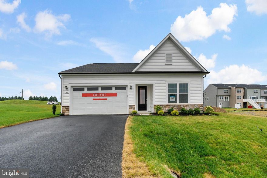 FIRST FLOOR LIVING AT ITS FINEST, MAIN FLOOR PRIMARY SWEET AND ADDITIONAL LIVING SPACE UPSTAIRS!
THE LARGEST HOMESITES WITH THE BEST VALUE IN SOUTH BERKELEY** NOW OFFERING UP TO $15,000 CLOSING COST ASSISTANCE FOR PRIMARY RESIDENCE WITH USE OF APPROVED LENDER AND TITLE!** 
Undecorated Field Model! Experience luxurious single-story living in this exquisite ranch-style home, featuring three bedrooms and three full baths designed for elegance and convenience. The gourmet kitchen is a chef’s dream, boasting quartz countertops, a stainless steel hood, upgraded cabinets, lighting, and a spacious walk-in pantry. The primary suite offers a serene retreat with tray ceilings, a lavish walk-in closet, and a spa-like ensuite bathroom with an oversized, tiled shower and premium fixtures. Enjoy an airy, open layout with 9-foot ceilings, an 8-foot glass entry door, and a generous two-car garage, while the large laundry room with extra storage adds practicality. A second-floor bonus space includes an additional primary bedroom with a full bath and walk-in closet, perfect for guests or flexible living. Nestled in the peaceful South Brook community of Inwood, this home combines tranquil mountain living with easy access to Martinsburg’s dining and shopping, as well as I-81 for seamless travel. Don’t miss this opportunity—schedule your tour today!