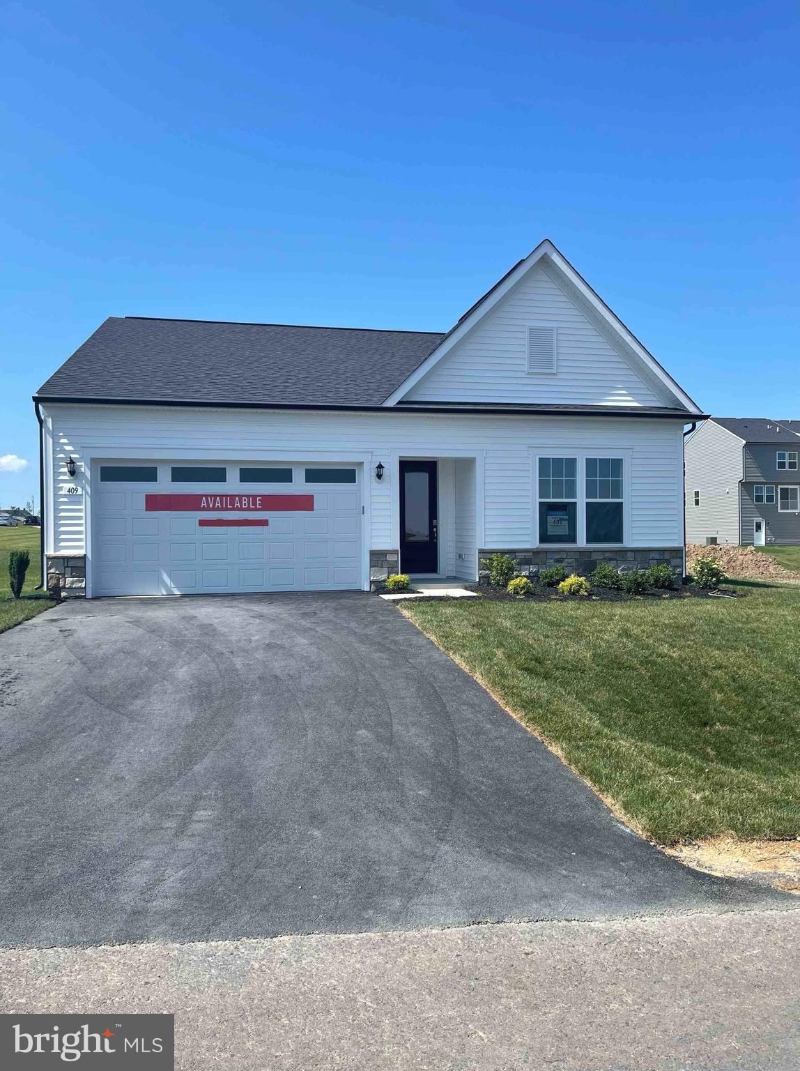 **UP TO $15,000 CLOSING COST ASSISTANCE FOR PRIMARY RESIDENCE WITH USE OF APPROVED LENDER AND TITLE!**
Experience luxurious single-story living in this exquisite ranch-style home, featuring three bedrooms and three full baths designed for elegance and convenience. The gourmet kitchen is a chef’s dream, boasting quartz countertops, a stainless steel hood, upgraded cabinets, lighting, and a spacious walk-in pantry. The primary suite offers a serene retreat with tray ceilings, a lavish walk-in closet, and a spa-like ensuite bathroom with an oversized, tiled shower and premium fixtures. Enjoy an airy, open layout with 9-foot ceilings, an 8-foot glass entry door, and a generous two-car garage, while the large laundry room with extra storage adds practicality. A second-floor bonus space includes an additional primary bedroom with a full bath and walk-in closet, perfect for guests or flexible living. Nestled in the peaceful South Brook community of Inwood, this home combines tranquil mountain living with easy access to Martinsburg’s dining and shopping, as well as I-81 for seamless travel. Don’t miss this opportunity—schedule your tour today!