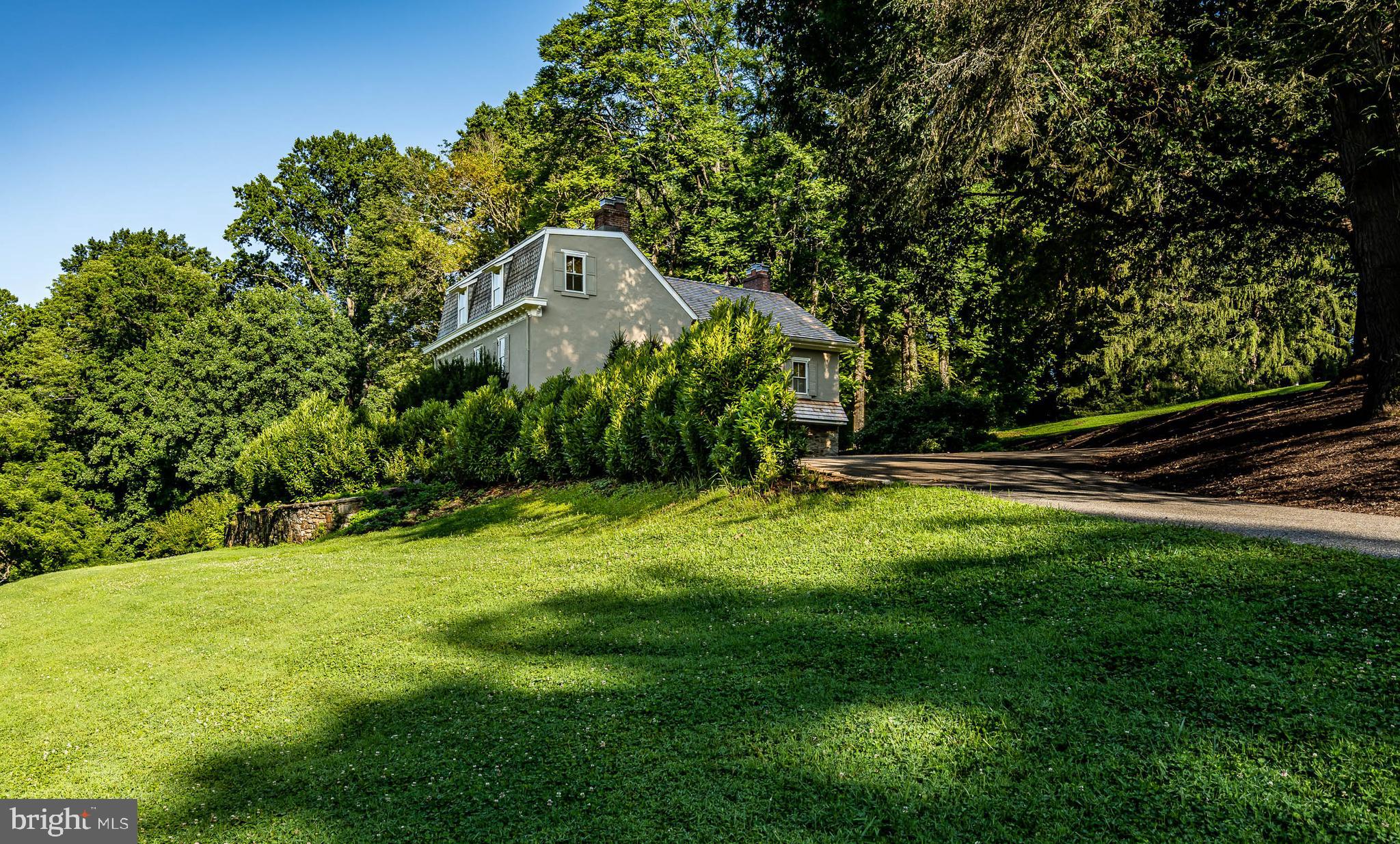Rarely does a home with this mix of history, quality and style come on the market.  Dating back to 1789, the house has been updated over the past few years—with a light but disciplined touch—to meet the requirements of 2022, even as its historical features and connections have been retained and restored.  The result is a very livable home that wears its historical features proudly, but lightly. Key features of the home include: Large living room, dining room, and kitchen on the first floor, with adjoining  patios; Two bedrooms on the second floor, each with en-suite baths; Office adjacent to the second floor stairway; Bedroom on the third floor, with large en-suite bathroom, including laundry hook-up, and a large bonus room with exposed 18th century rafters and skylights; Spacious and surprisingly airy lower level with exposed stone walls and concealed laundry, utilities, and storage space, plus a half bath. The home is done throughout in a restrained style, using natural finishes and a neutral palette that complements and refreshes the home’s great 18th century bones. As nice as the interior is, the exterior is what 1105 Brintons Bridge Road is mostly about.  It features 6 rolling acres of Chester County countryside, none of which is deed restricted. The property provides total privacy, with the road frontage and east and west borders planted with over 100 evergreen trees. Tall old trees—both deciduous and evergreens—ring the property’s northern borders. 18th century ruins of an old farm building have been restored by the current owner. There is an interesting shed (still needing restoration) built and used by a former owner for stargazing, with a roof that opens (though it is now secured shut) and that a famous neighbor/artist used to inform his art. All this in the highly ranked Unionville-Chadds Ford school district and in a sought-after neighborhood rich in Brandywine Valley history. Showings begin Saturday, July 16th.