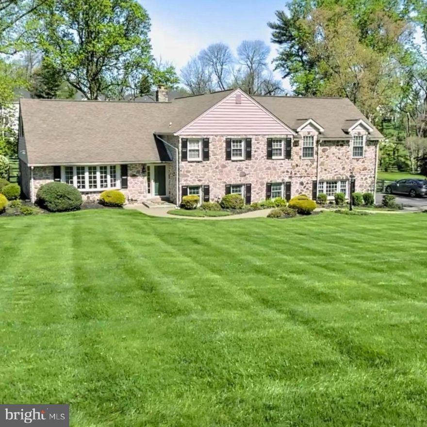 Here it is-the home you've been waiting for!! Just steps to Episcopal Academy & Aronimink Golf Club is this sprawling, level one-acre property.  This timeless, expanded split-level home offers exceptional curb appeal, generous living space, and a versatile layout- ideal for today's lifestyle. With approximately 3,600 sq. ft. the home features a seamless flow between living, dining, and kitchen areas with beautiful hardwood floors and wainscotting throughout. The main floor includes a large sun-drenched living room, a beautiful kitchen with large center island, WOLF gas cooking, granite counter tops, SUB ZERO refrigerator and stainless appliances. The Kitchen is open to the dining room and boasts glass doors that open to a large Timber deck and NEW (2023) flagstone patio complete with extensive landscape lighting (including lighting embedded in the stone), gorgeous 10' Tall holly privacy trees and handsome stone chimney fireplace. Turn up the surround sound speaker system, and this exceptional space will have you dreaming of summer BBQ's and all the activities you could enjoy in the A++ backyard that is perfectly framed by the picturesque post & rail fencing.  
Back inside the home, head down to a spacious lower level that is above grade. You will be immediately impressed with the recently renovated (2024) full-size wet bar/ bonus room complete with custom cabinetry, and quartz countertops. Shiplap wraps around the wall space and gas fireplace giving an elevated pub vibe and there is also a half bath & clear views here out to the new outdoor living space.  Adjacent to this bonus space is a sizeable family room which also provides access to the attached 2-car garage with fantastic built -in cabinetry and electric car charging station.  
The upper level(s) are home to 4 spacious bedrooms.  The primary suite was a huge addition, added on by the current owners in 2013. It has vaulted ceilings, 2 large walk-in closets, recessed lighting, luxurious bathroom with glass stall shower, dual vanity, and private water closet.  Bedroom #2 features an en-suite bathroom, and the other 2 bedrooms share a recently updated hall bath with a new vanity and mirror and lighting in 2026. 
This fabulous property has it all; curb appeal, space, comfort, fantastic upgrades, and a location to die for. Make this home yours in time for the PGA Championship coming to Aronimink Golf Club this May!! Just 5 minutes to the Main Line (Wayne/Devon) as well as the brand-new Newtown Town Center (Whole Foods, Sedona Tap House, La Scala's & loads of shops & restaurants). 
Rtes. 252, 30, 3 are all within a 5-minute drive (or less), while Rte's 476, 202 are just a few minutes beyond that making it a super accessible location to anywhere you desire. Do not wait on this one. This is a RELO sale.