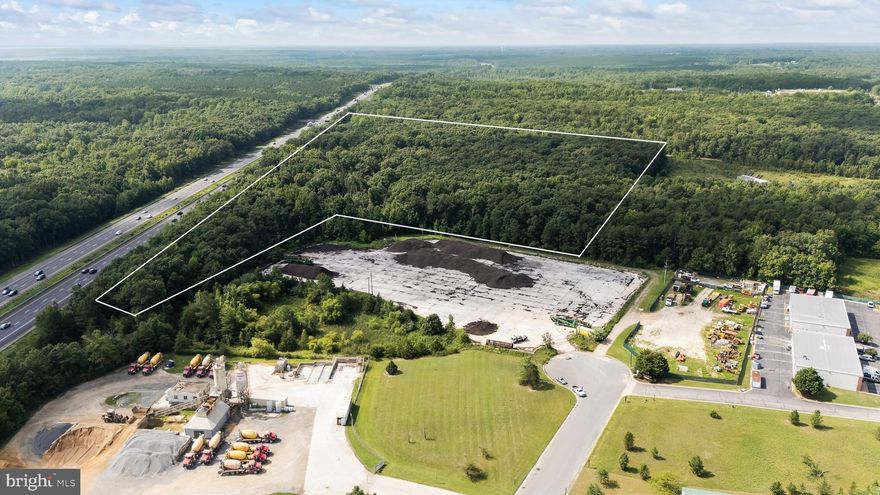 Two lots being sold     50-A-30 and 50-A-31  . Total of four tracks of land .  East and west of 95 parcels could have different potential zonings so the seller may choose to sell separately  Pictures are coming up soon  .