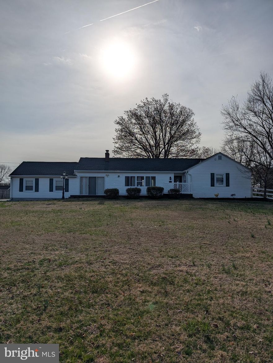Beautiful 3/2 Rancher, amazing light and views. 1.42-acre lot. Driveway parking for 10+ cars. 2-car attached garage + 4-car detached garage. Recent updates will include kitchen, 2 baths, driveway, crawl space, basement, well pump & filtration, HVAC/ducts, appliances, patio, fence, Livingroom Window, front partial siding, Garages Door Opener, electric panel, septic cap. Heating: oil & heat pump (Both are available). Subdivisible lot.