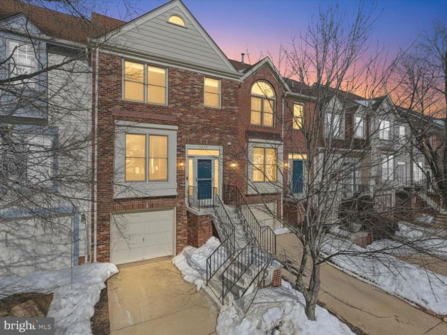 Beautiful four-level townhouse with garage in the heart of Sterling, VA—designed for flexible living and effortless style. This spacious 3-bedroom, 2 full, 2 half bath home offers thoughtfully updated interiors, abundant natural light, and multiple indoor and outdoor spaces perfect for today’s lifestyle. The open main level features an updated kitchen with stainless steel appliances, ample cabinetry, and sleek finishes that flow seamlessly into the living and dining areas. Vaulted ceilings and oversized windows create a bright, airy vibe, while the expansive deck just off the main level is ideal for morning coffee, casual dinners, or entertaining friends. Upstairs, the primary suite is a true retreat with generous closet space and a spa-inspired en-suite bath featuring a soaking tub, double vanity, and separate shower. Two additional bedrooms and a well-appointed full bath provide space for guests, a home office, or a growing household. The finished walk-out lower level adds even more versatility with a recreation room featuring built-in shelving, a half bath, and direct access to a private patio—perfect for relaxing outdoors or extending your entertaining space.  Excellent location just minutes to Costco, Dulles Town Center, and Sugarland Crossing Shopping Center, offering a wide variety of shopping, dining, and everyday conveniences. Easy access to Route 7, FFX County Parkway, Route. 28, and the Dulles Access Toll Road! Turn key and ready to move in now! Schedule private showings online.