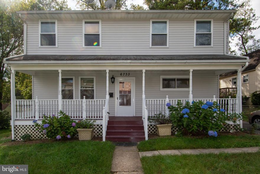 Updated, Cozy and Charming home in convenient Falls Church location, Gorgeous renovated kitchen (2021) w/all stainless-steel appliances, upgraded countertops, lots of storage and workspace, recessed lighting and more.  Hardwood floors and fresh paint throughout, nicely sized rooms upstairs and main level and check out the front porch, yard and rear deck - perfect spaces for relaxing and entertaining!  Easy access to shopping, schools and major commuter routes.  Mandatory professional mowing required.  Please note:  The property is currently tenant occupied.  To protect tenant privacy, vacant listing photos taken prior to tenant move-in are shown.