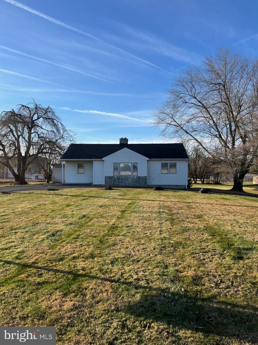 This is 1.02 acres Zoned GI .,with existing House previously used for Offices Rough 2600 sq.ft. . Roughly 150 ' of Road  Frontage . Property is on Well and Septic. Backs to Air Park.