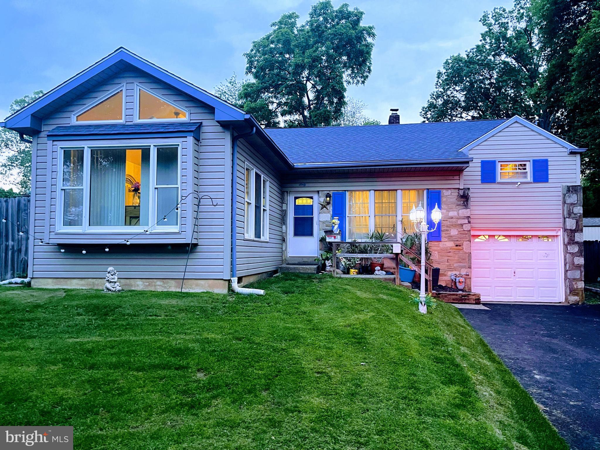 Spacious front-to-back split with four levels that include 4-bedrooms and 2.5 bathrooms. This home is on a desirable corner lot with fencing, tall privacy trees, and fruit trees. There is a beautiful, large cherry tree in the front yard. The side and backyard contain an Italian plum tree, a peach tree, and a few blueberry bushes. The property is perfect for outdoor entertaining. The lovely sideyard boasts a beautiful patio. This yard oasis has several other additional spots for relaxing. A wood shed allows for extra storage. As you walk into the home, you enter the living room with high ceilings and an open layout to the dining room. The dining room area has newer French doors that lead to the patio. This level has a family room addition to the home with a cathedral ceiling, skylights, and natural lighting from the enormous windows. There are also two extra sizable closets. The kitchen features granite countertops and newer appliances. The kitchen includes a Bosch dishwasher, a GE oven, and an aerator garbage disposal. The kitchen cabinets are real wood. Downstairs has a generous-sized den with tile flooring, a spacious half bathroom, and a roomy laundry room with extra storage cabinets. The laundry room has doors to the backyard and garage that contains a crawlspace. Upstairs from the living room, you will find 3 bedrooms. There is a newly finished full bathroom in the hall and a full en-suite bathroom in the master bedroom. The master bedroom has attractive double mirror closet doors. The larger of the two other bedrooms has a substantial size new window. The staircase down the hall leads to the fourth bedroom with an impressive long closet. The fourth bedroom has access to an attic that spans the length of the home. You will enjoy the thoughtful extras added to the home such as ornate wood trim, ceiling fans throughout, and the central air. Six rooms in this home have brand-new Pergo hardwood floors. This home is conveniently located near Costco, multiple grocery stores, restaurants, shopping centers, schools, libraries, and movie theaters. The seller, a decade ago, was briefly a PA-licensed real estate agent. Schedule a weekend showing today!