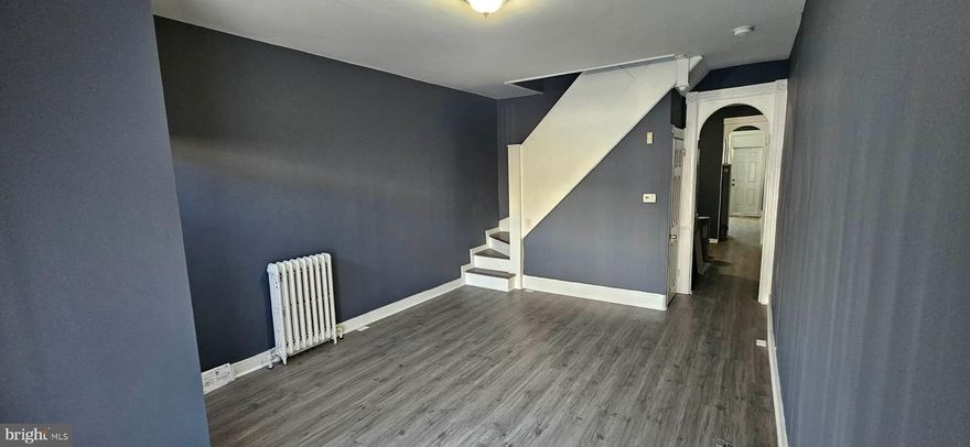 Welcome to 1519 N Wolfe Street, a well-located Baltimore City home offering convenience, character, and easy access to everything the city has to offer. Situated in the heart of East Baltimore, this property is just minutes from Johns Hopkins Hospital, major commuter routes, public transportation, shopping, dining, and neighborhood amenities.

This residence features a functional layout with comfortable living spaces, ample natural light, and classic Baltimore rowhome charm. The kitchen offers plenty of cabinet space and room for everyday cooking, while the bedrooms provide flexibility for sleeping, home office, or guest use. The bathroom is clean and practical, designed for daily comfort.

The home includes a private rear area, ideal for relaxing or outdoor enjoyment, along with street parking and nearby transit options for added convenience. Whether you are looking for a place close to work, school, or downtown Baltimore, this location delivers accessibility and value.

Perfect for tenants seeking an affordable city home near major employers and institutions, 1519 N Wolfe Street offers a great opportunity to enjoy urban living in a central Baltimore location.